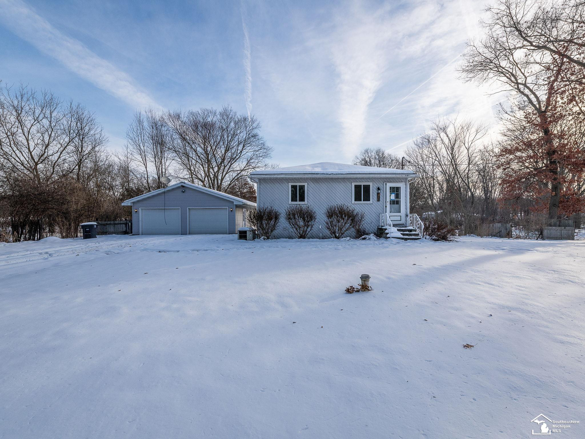 403 Maple Road, Michigan Center, MI 49254 — front exterior