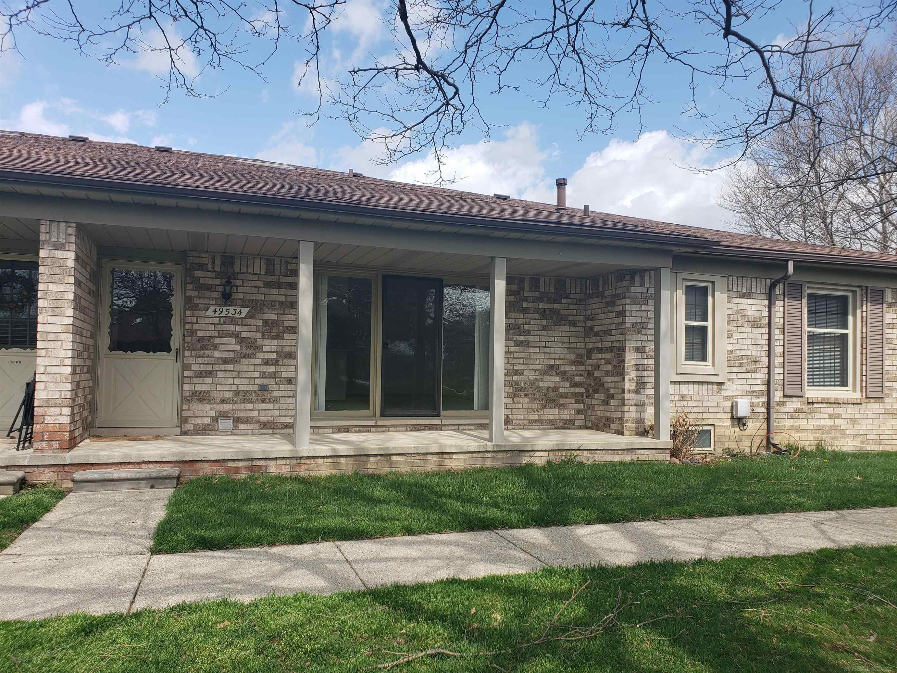 49534 Roxbury Court, Unit 2 Building 1, MI 48315 — front exterior