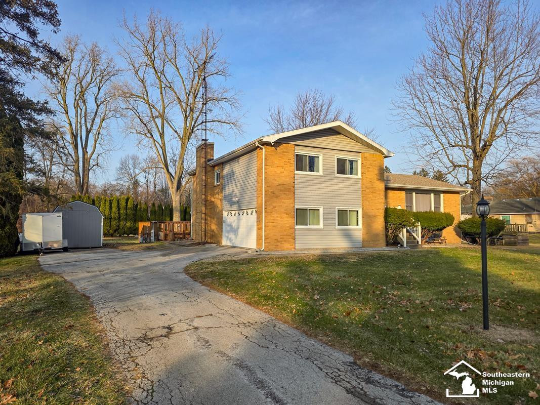 3334 Woodmont Drive, Lambertville, MI 48144 — front exterior