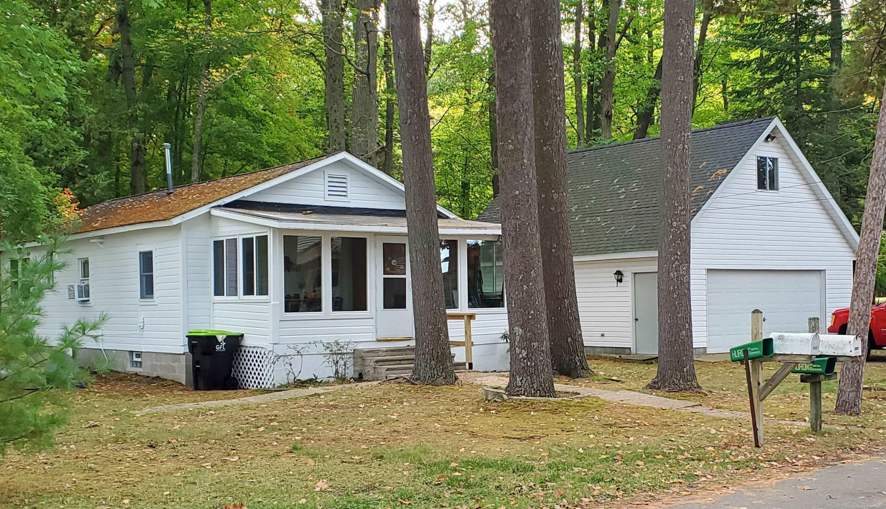 108 Warren Avenue, East Tawas, MI 48730 — front exterior