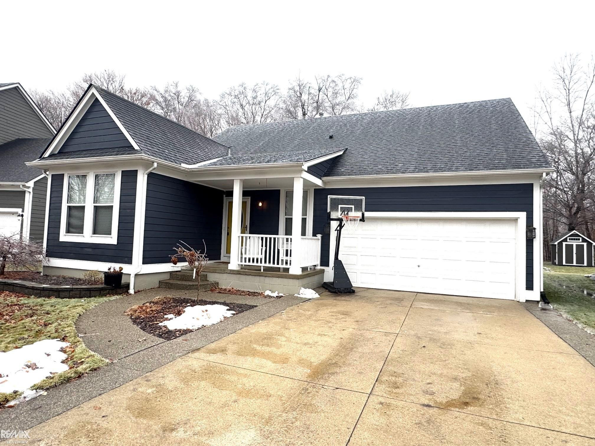 57421 River Oaks Drive, New Haven, MI 48048 — front exterior