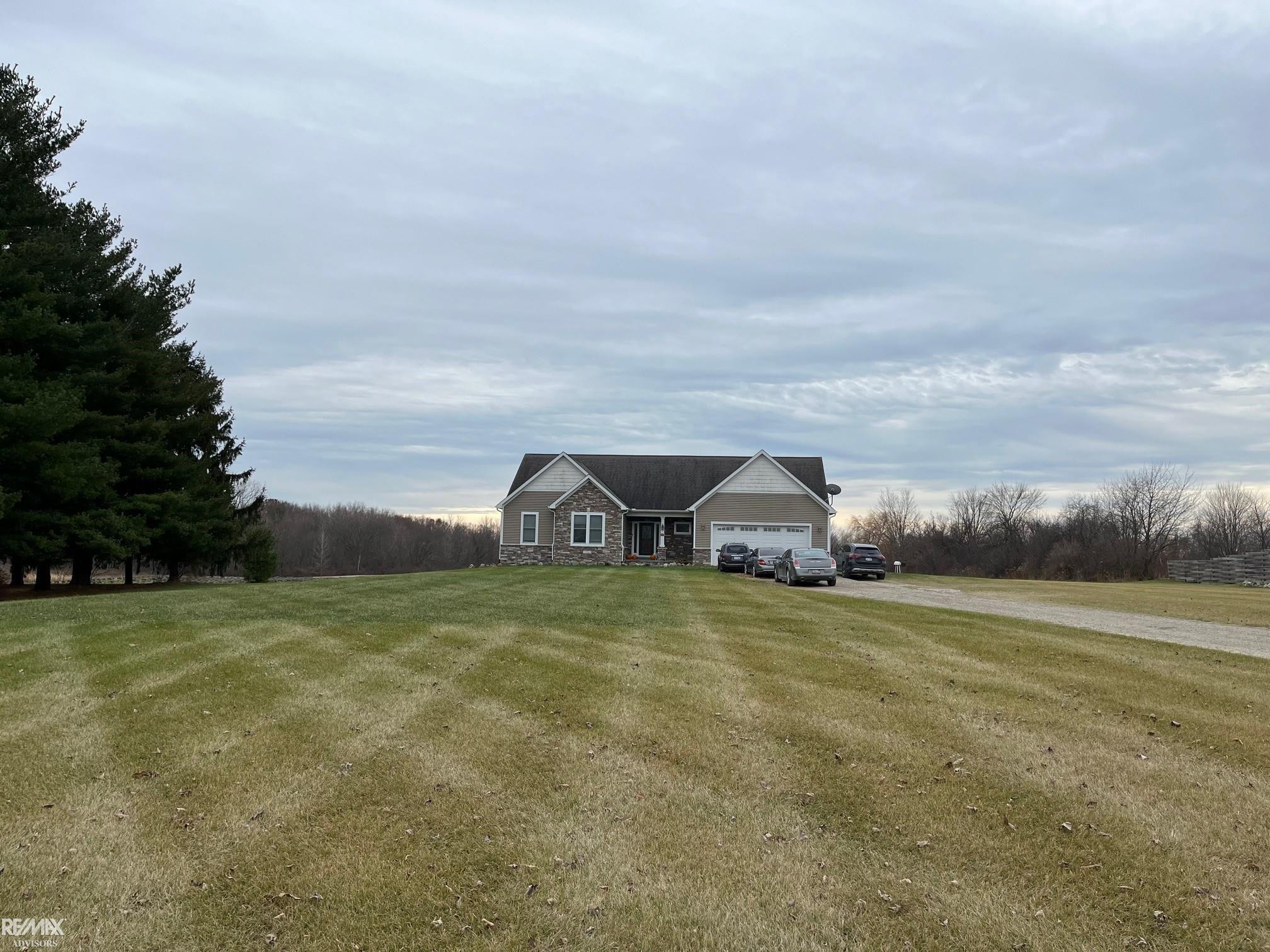 11173 Smiths Creek Road, MI — front exterior