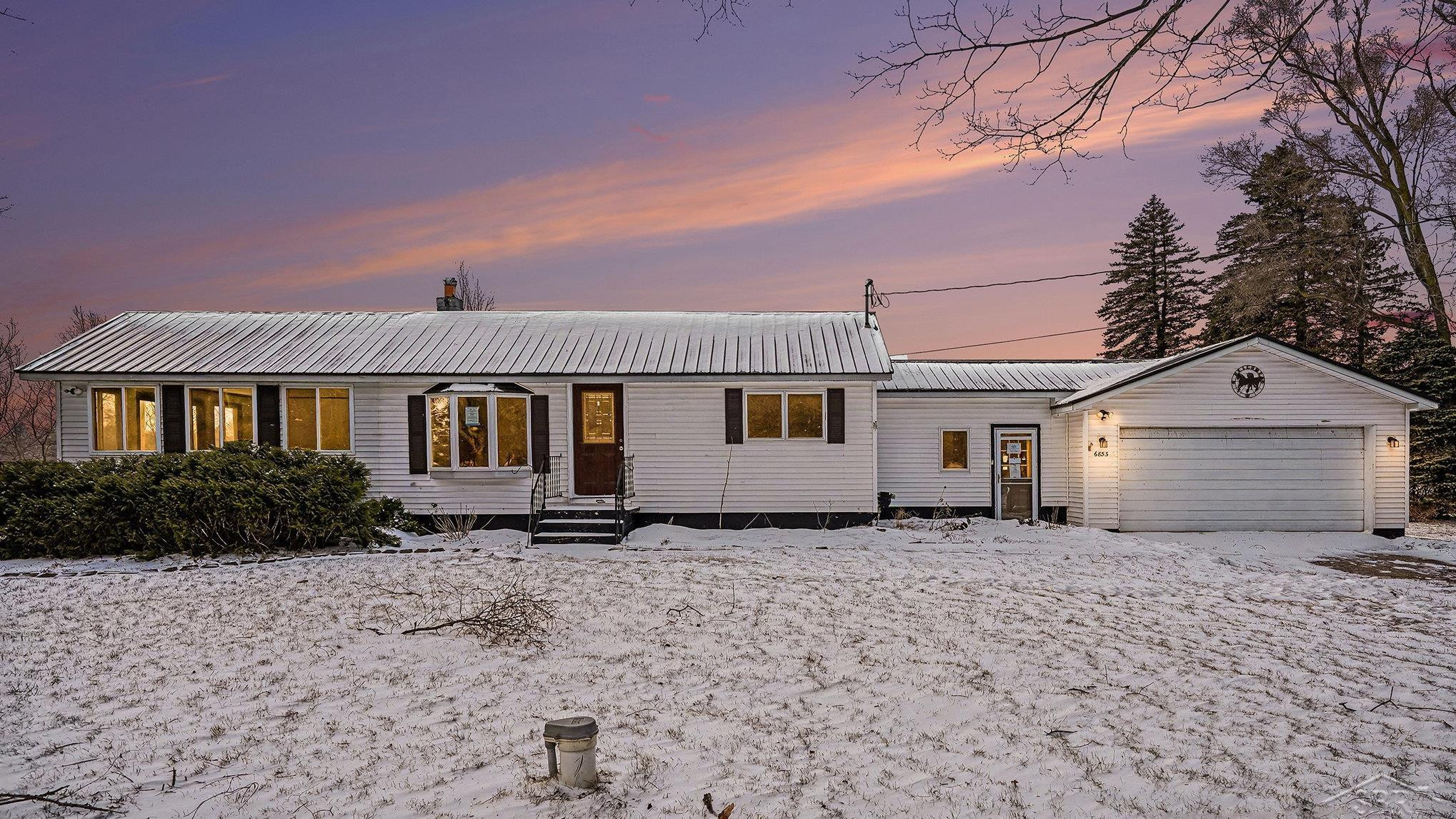 6853 N Caris Road, Vestaburg, MI 48891 — front exterior