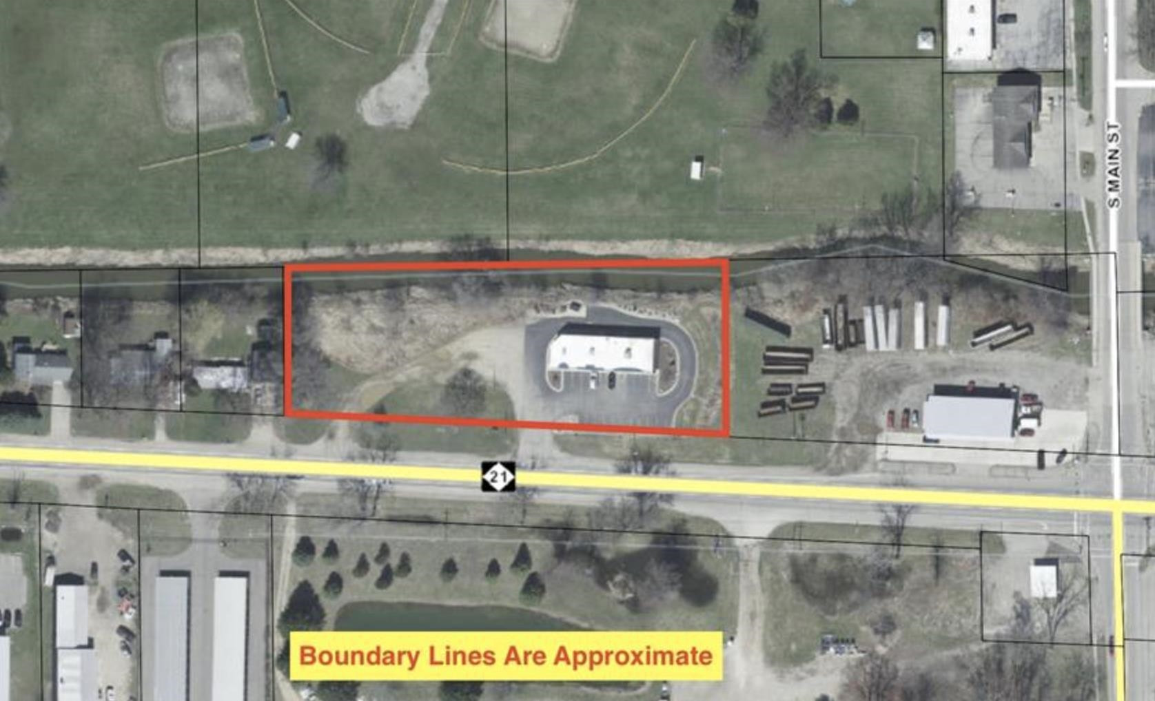 9595 E M-21 Highway, Ovid, MI 48866 — front exterior