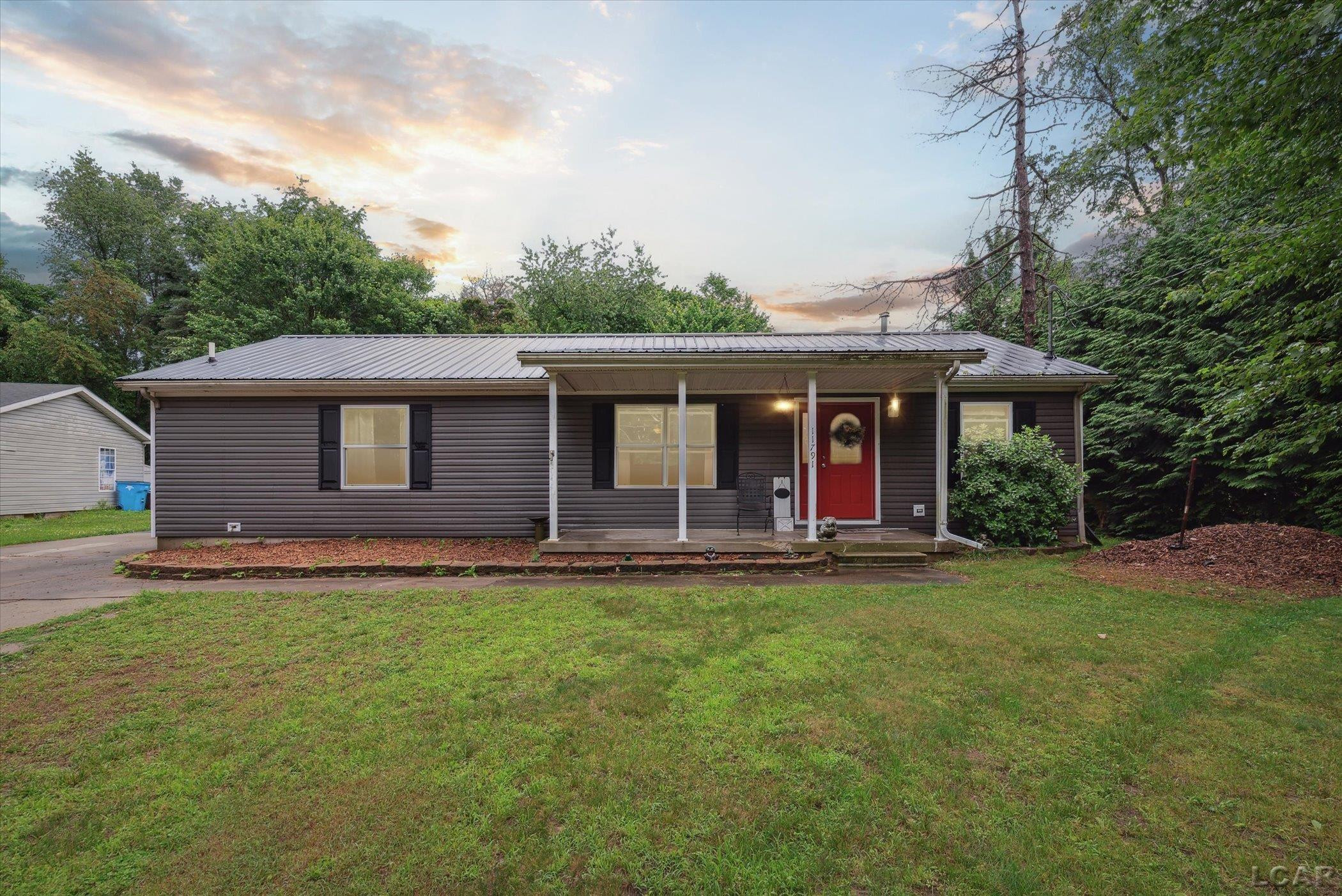 11791 Bradley Drive, Jerome, MI 49249 — front exterior