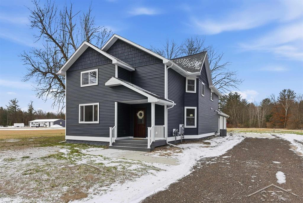 2797 N West River Road, Sanford, MI 48657 — front exterior