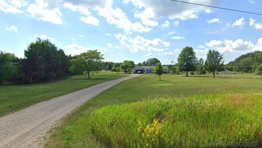 16445 Algoma Avenue, Cedar Springs, MI 49319 — front exterior