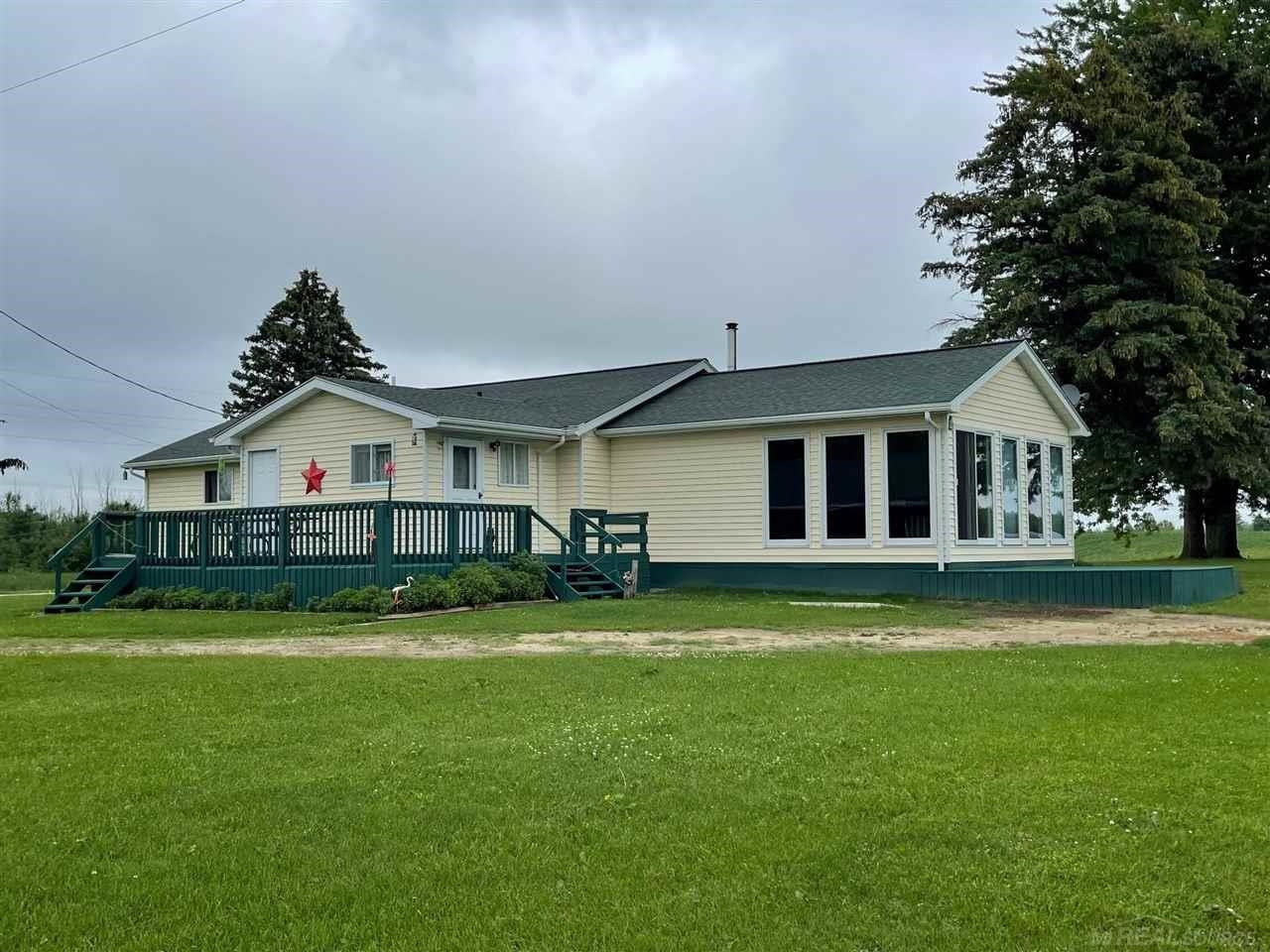 9973 Slattery Road, Clifford, MI 48727 — front exterior
