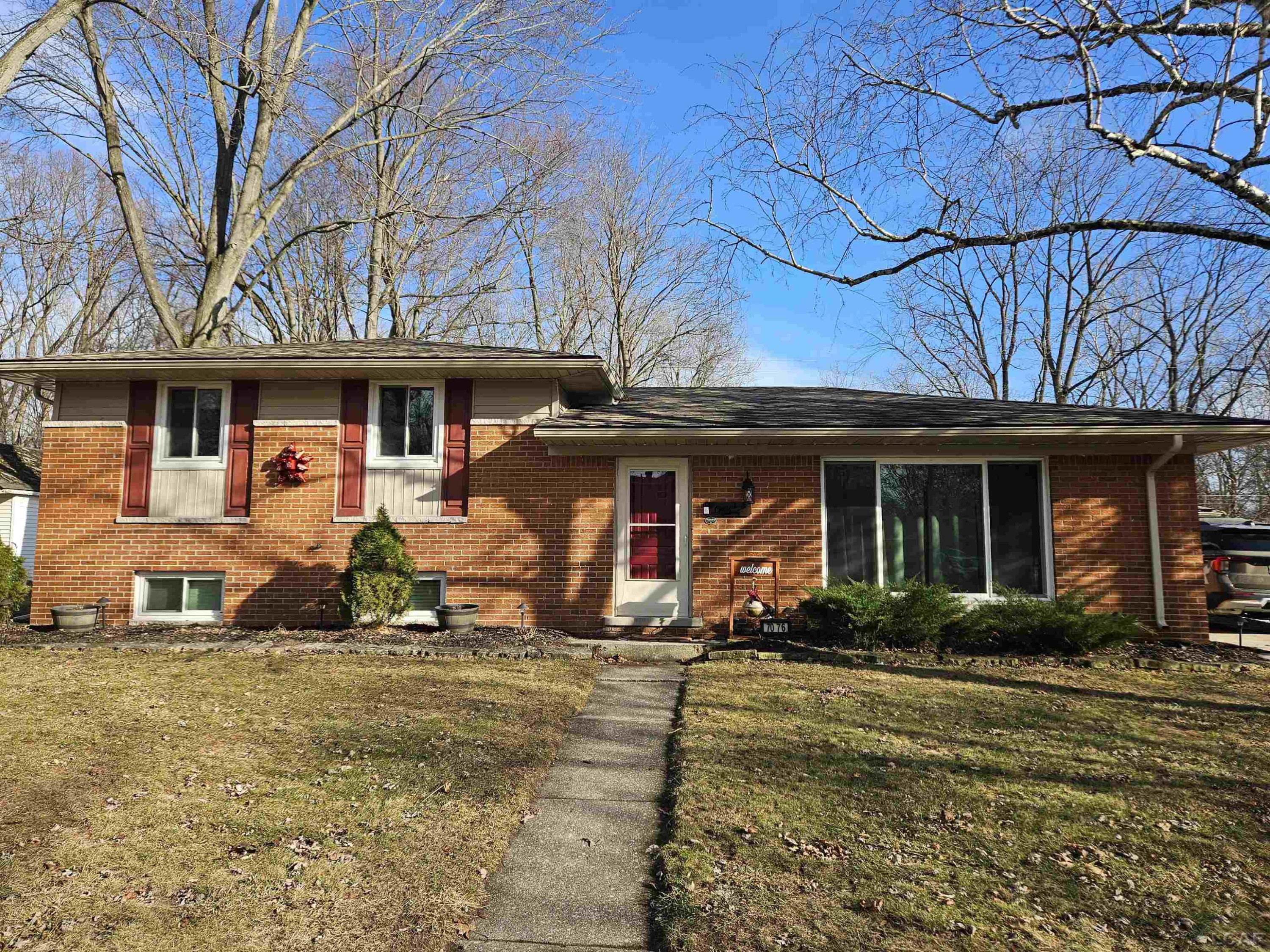 7076 Ridgedale Lane, Lambertville, MI 48144 — front exterior