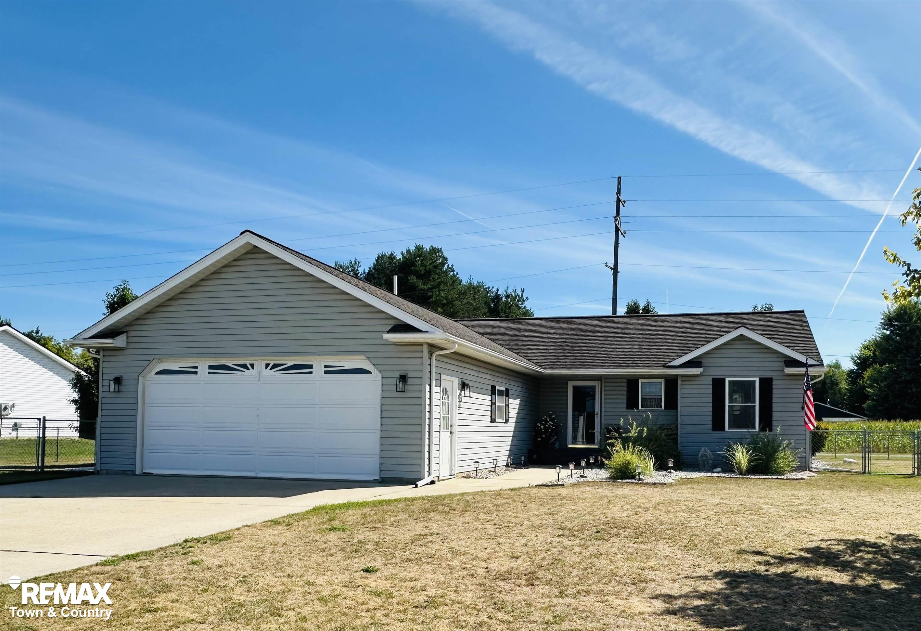 908 Pheasant Run, Gladwin, MI 48624 — front exterior