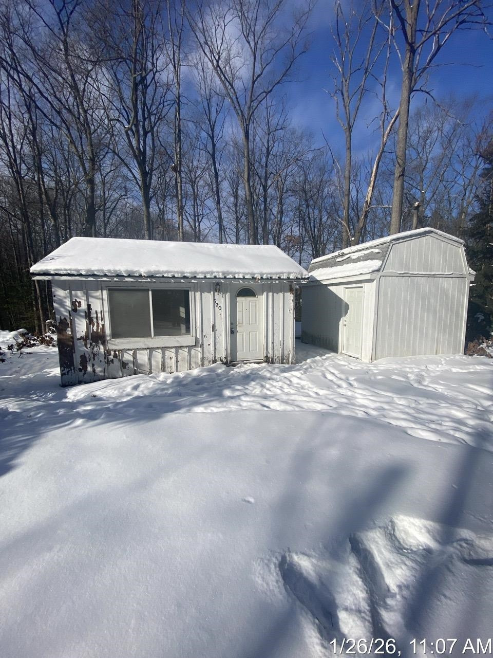590 Wilson Road, Harrison, MI 48625 — front exterior