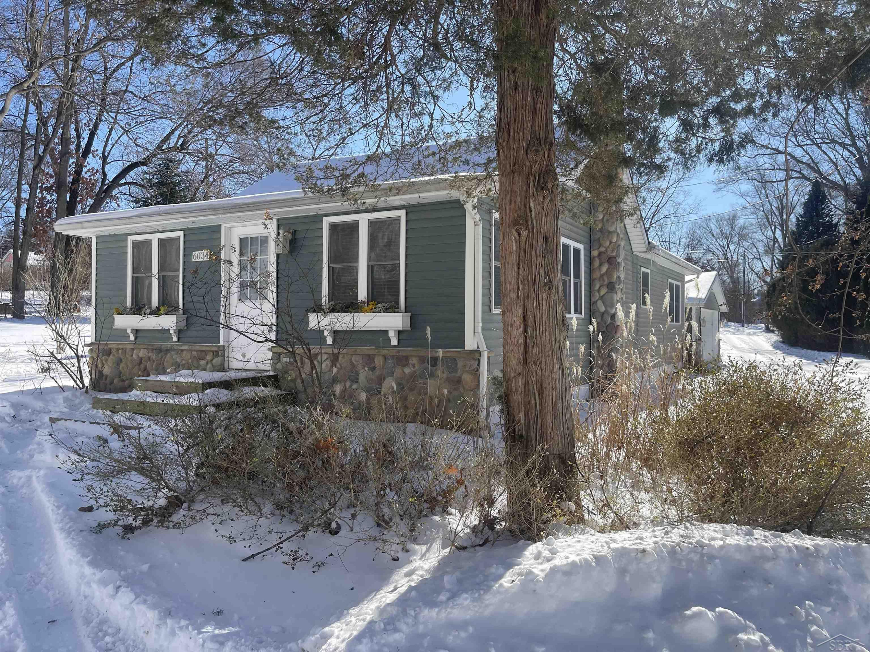 6034 Plymouth Drive, Brighton, MI 48116 — front exterior