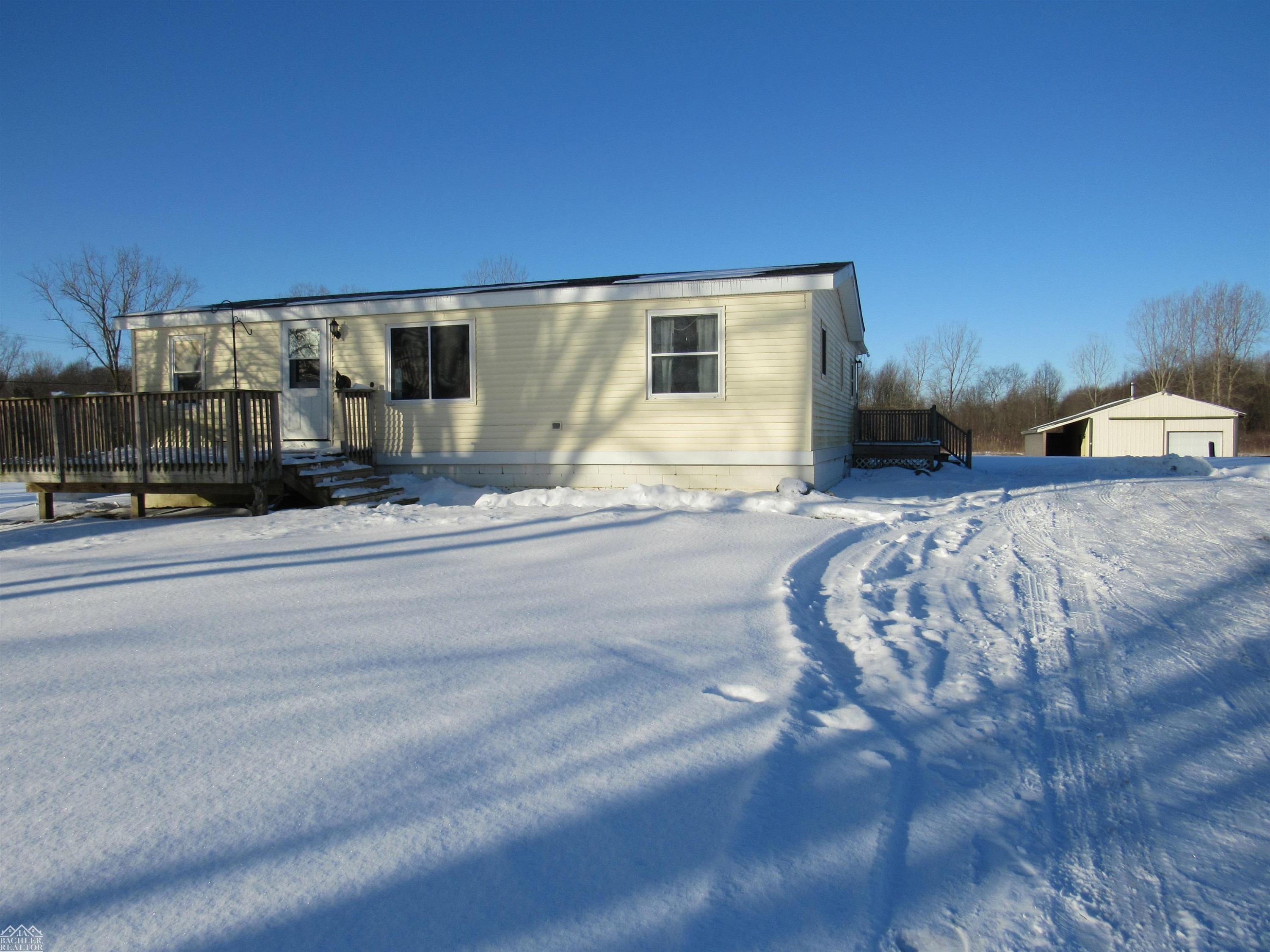 5490 Indian Trail, MI — front exterior