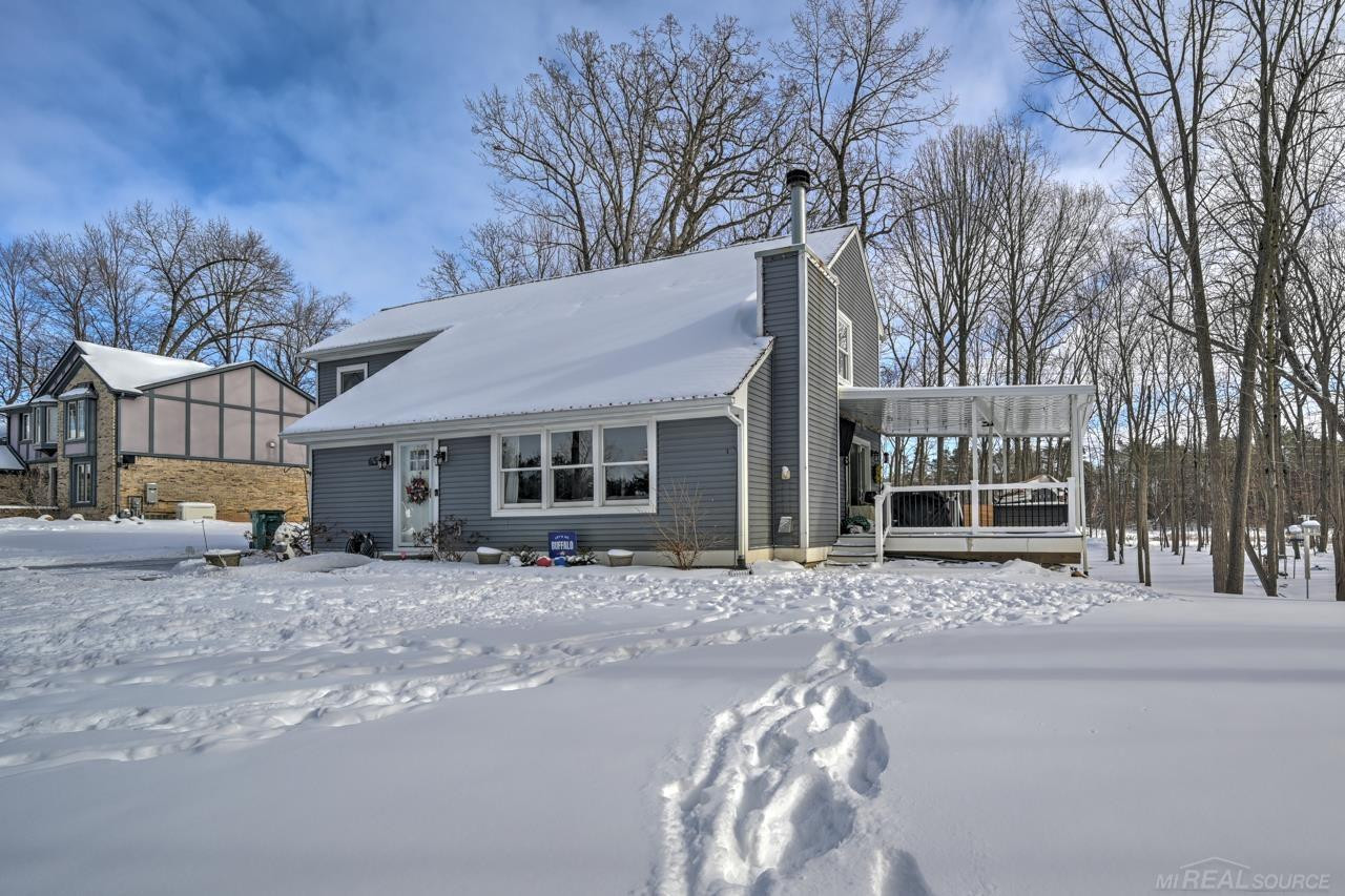 65 Woodside Lane, MI — front exterior