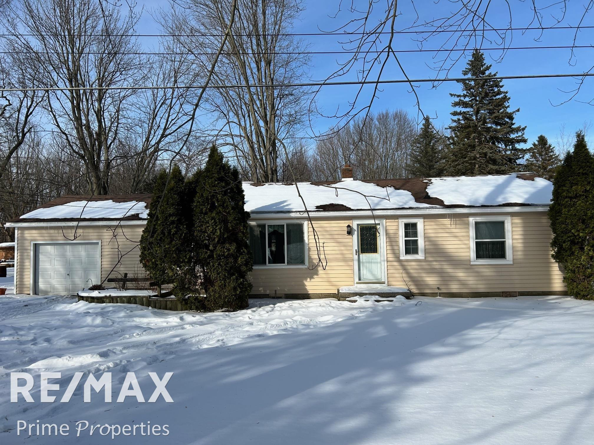1408 W Wilson Road, Clio, MI 48420 — front exterior