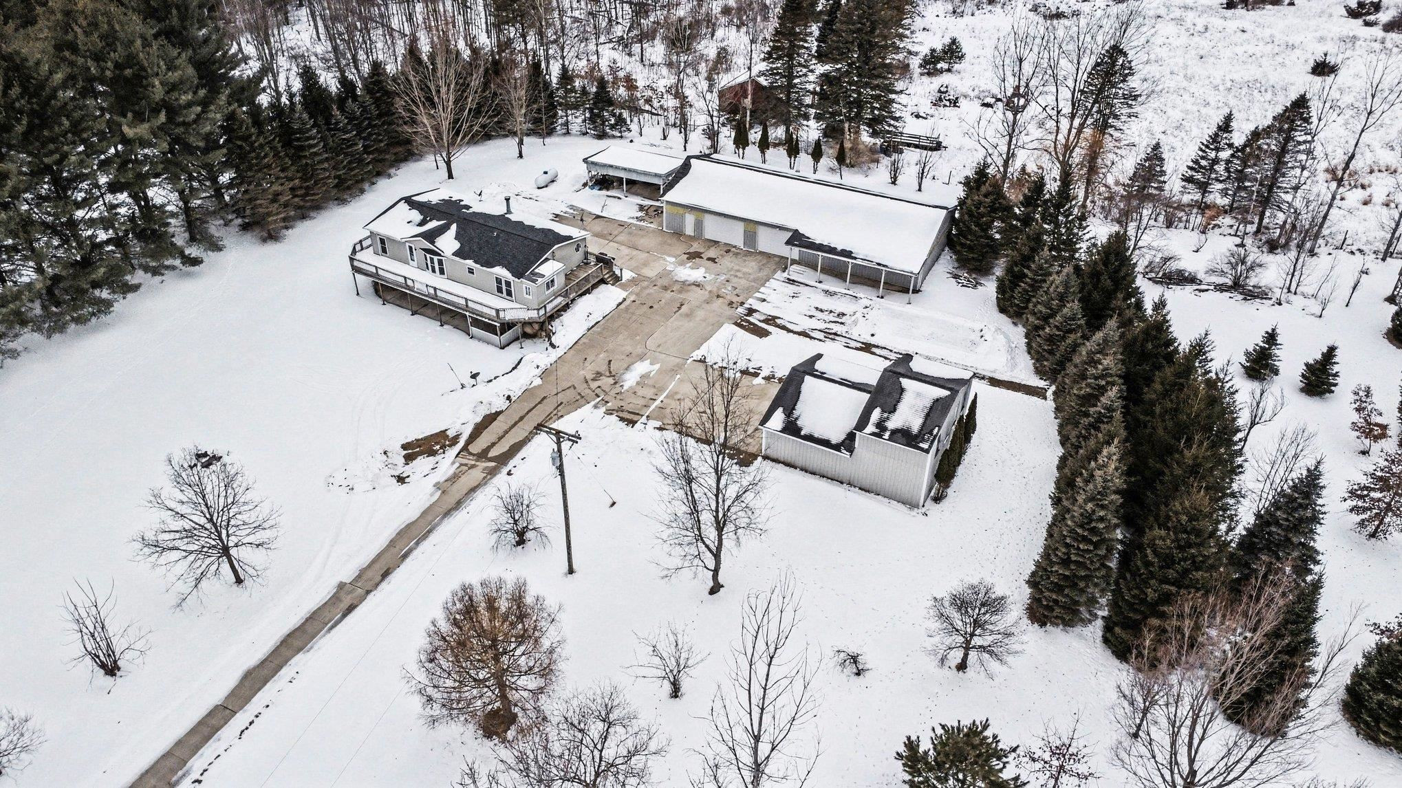 6189 Willits Road, Fostoria, MI 48435 — front exterior
