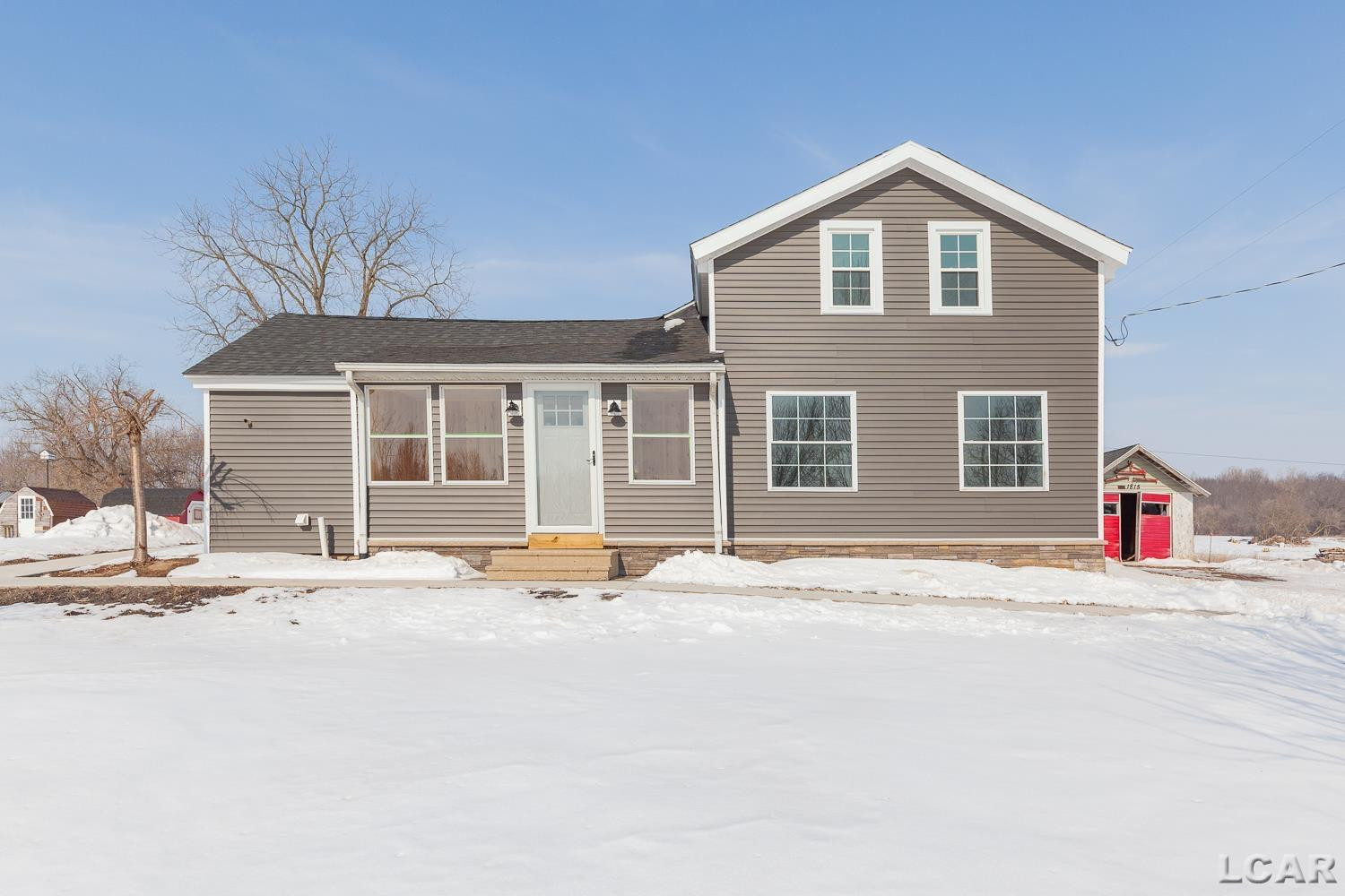 4730 Munger Road, Tipton, MI 49287 — front exterior