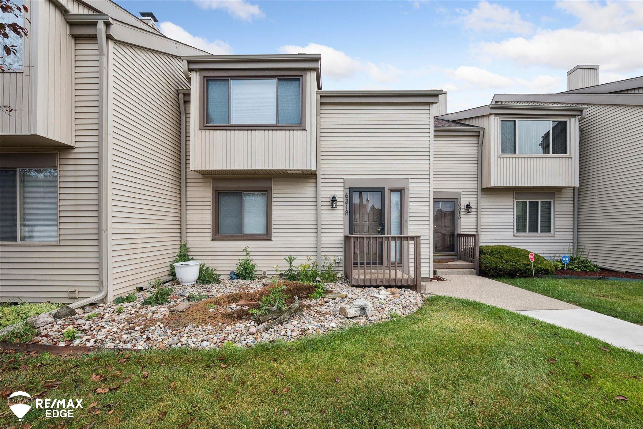 6318 Laurentian Court, Building 9 APT #42., Flint, MI 48532 — front exterior
