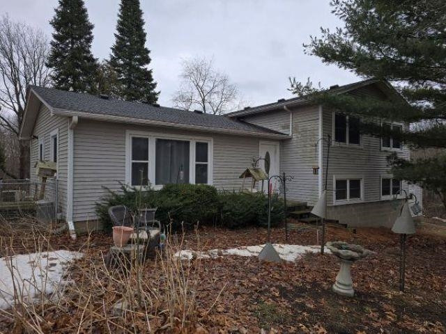 7628 N Latson Road, Howell, MI 48855 — front exterior