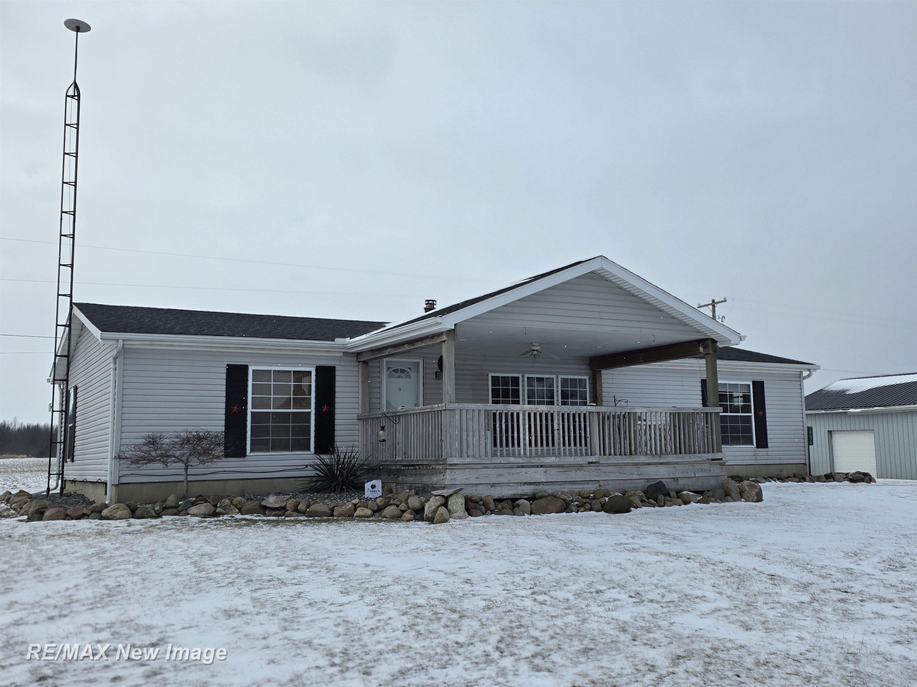 16475 Baldwin Road, Chesaning, MI 48616 — front exterior