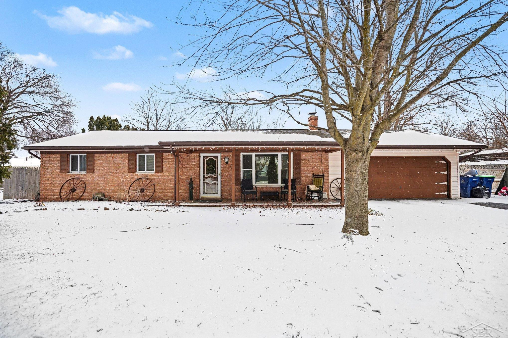 7821 Schirra Drive, Saginaw, MI 48609 — front exterior