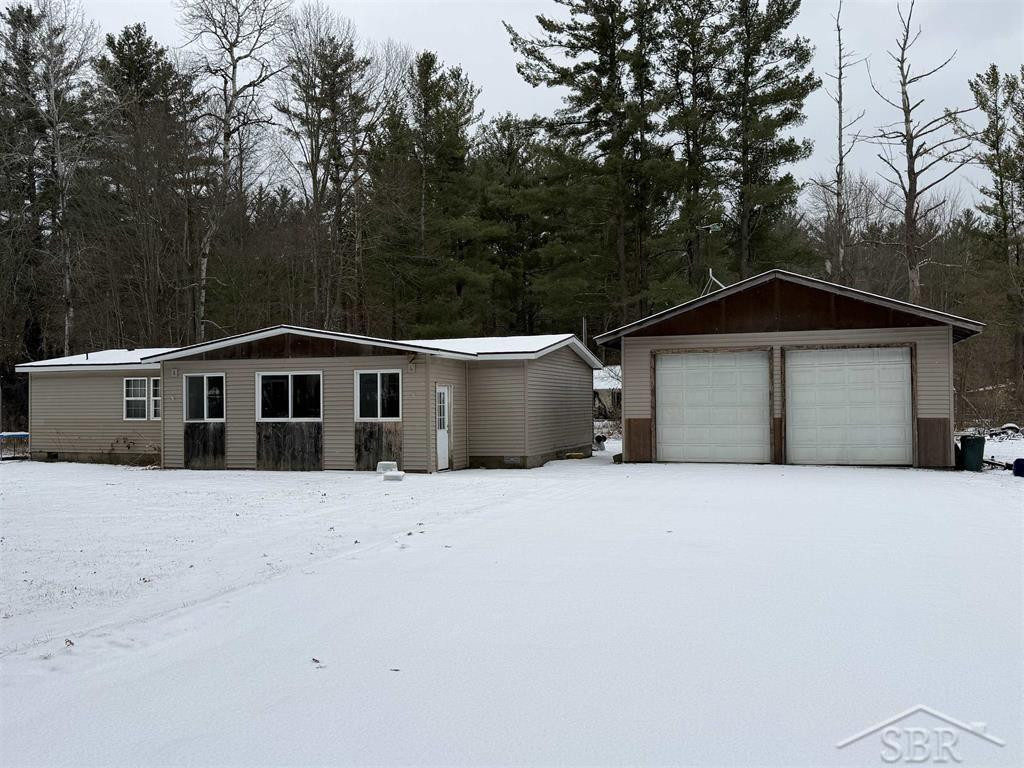 593 W Kessler Court, Sanford, MI 48657 — front exterior