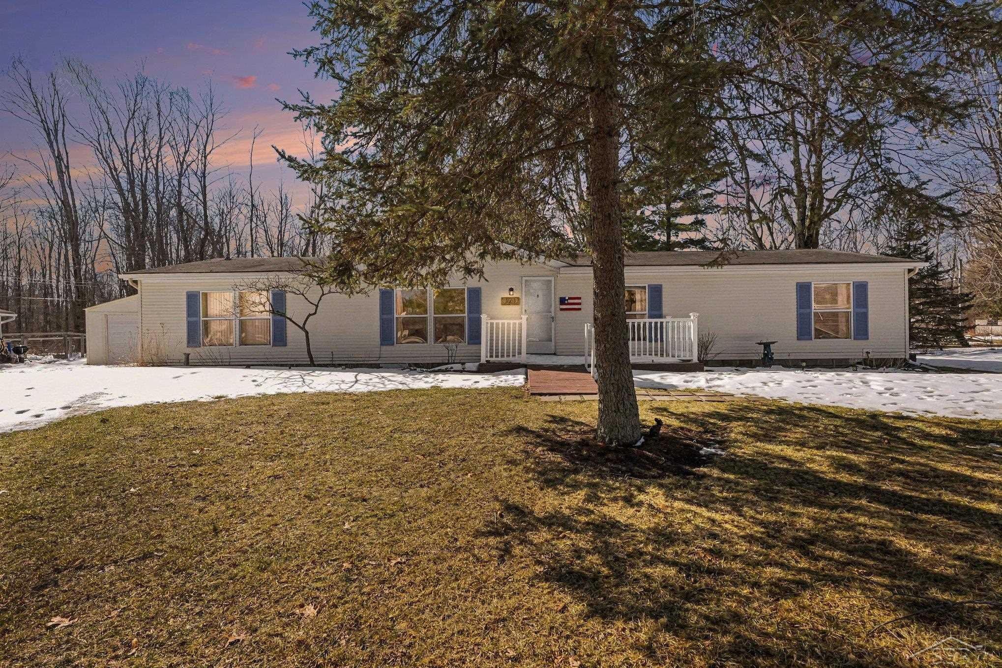 7247 Timber Trail, MI — front exterior