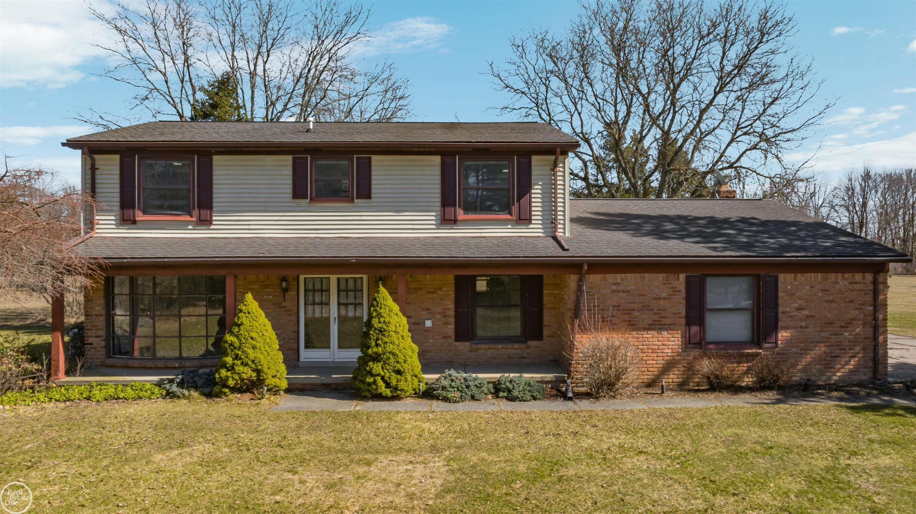 71800 Coon Creek Road, MI — front exterior