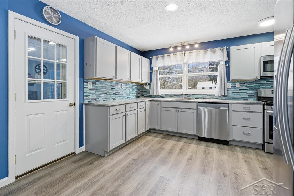 5519 Nurmi Drive, Midland, MI 48640 — Photo 9
