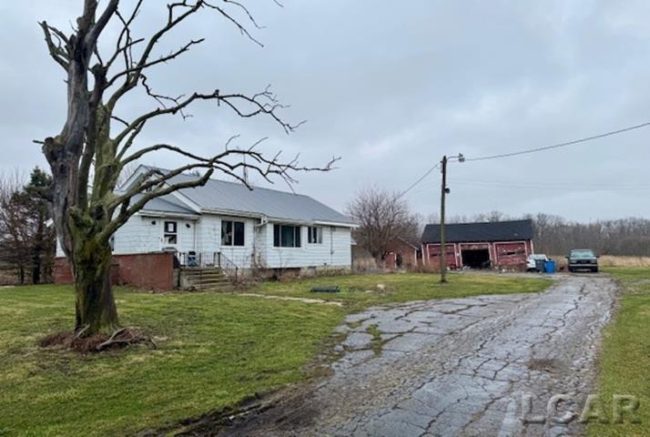 5377 Palmyra Road, Palmyra, MI 49268 — front exterior
