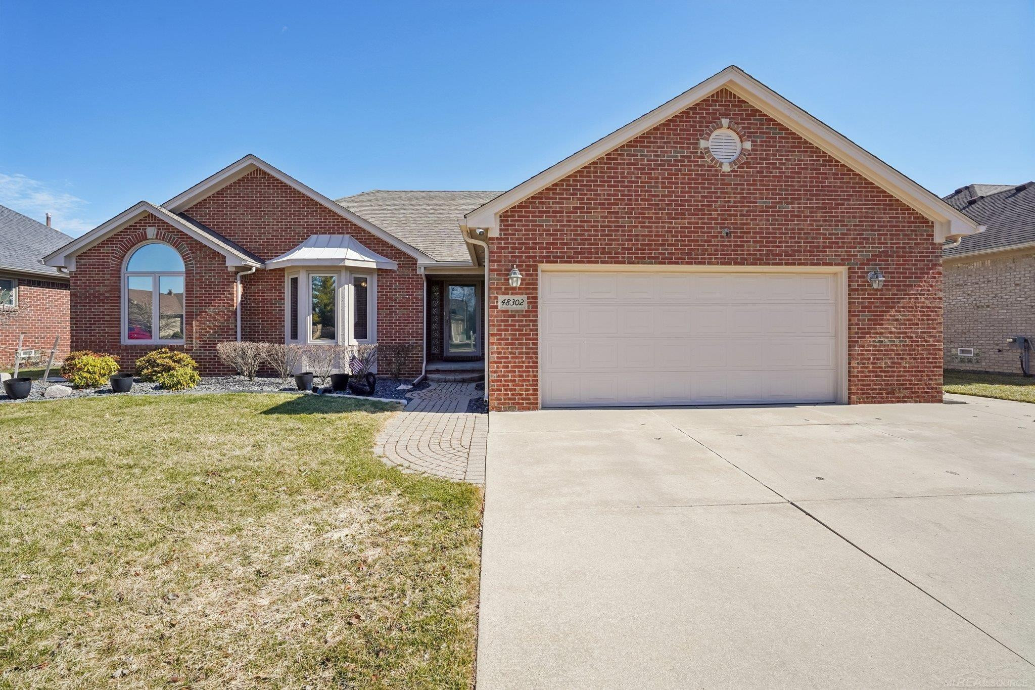 48302 Adams Drive, Macomb, MI 48044 — front exterior