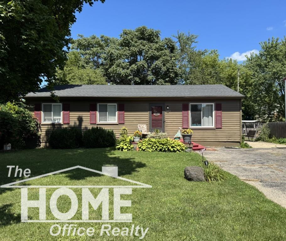 205 E Rolfe Street, Perry, MI 48872 — front exterior