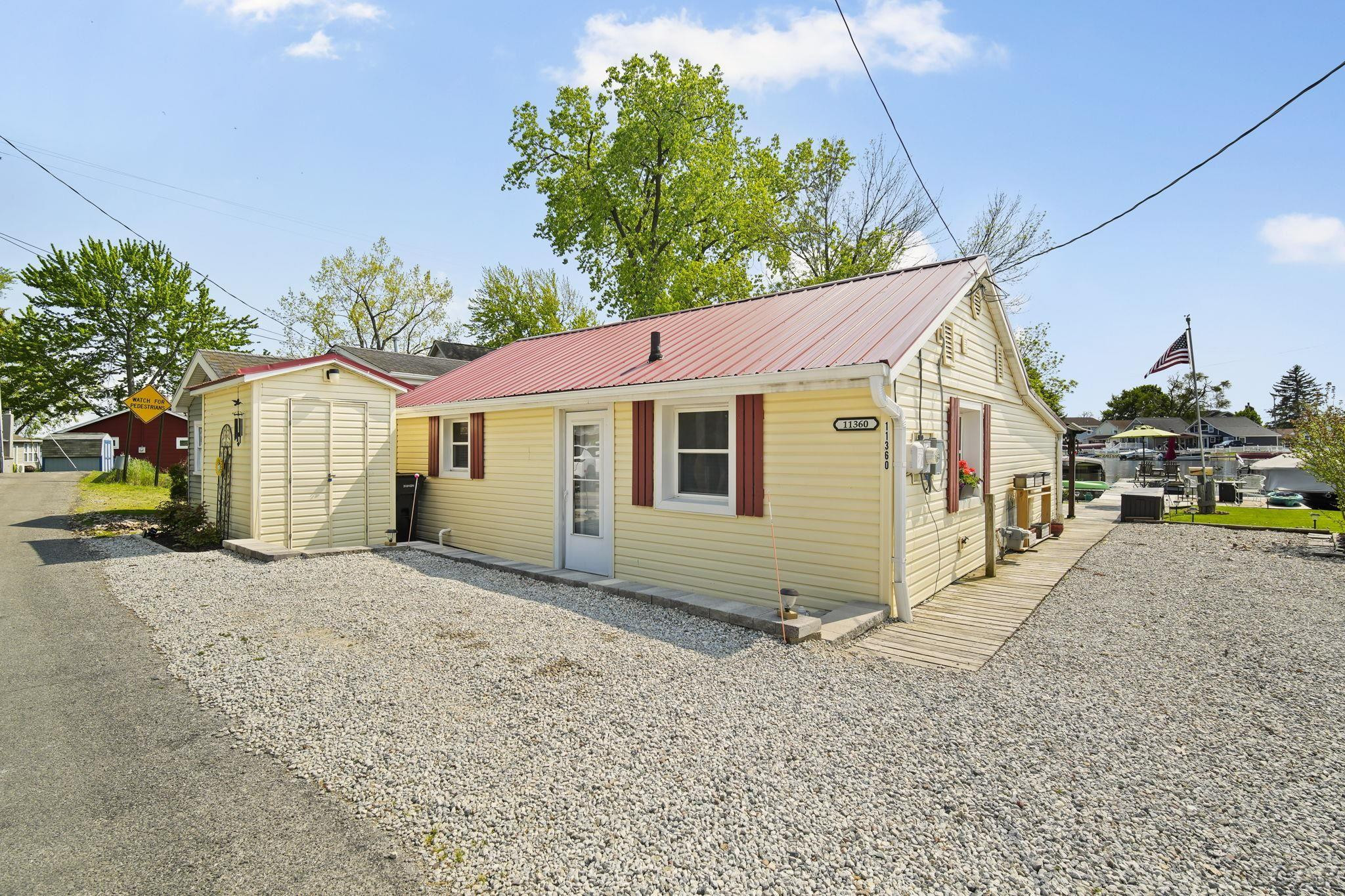 11360 W Ferndale Drive, Manitou Beach, MI 49253 — front exterior