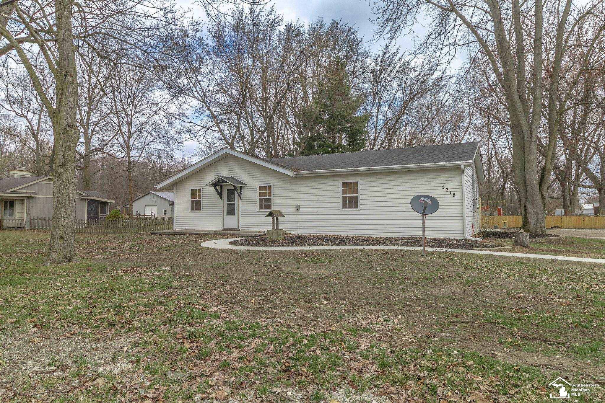 5218 Consear Road, MI 49267 — front exterior