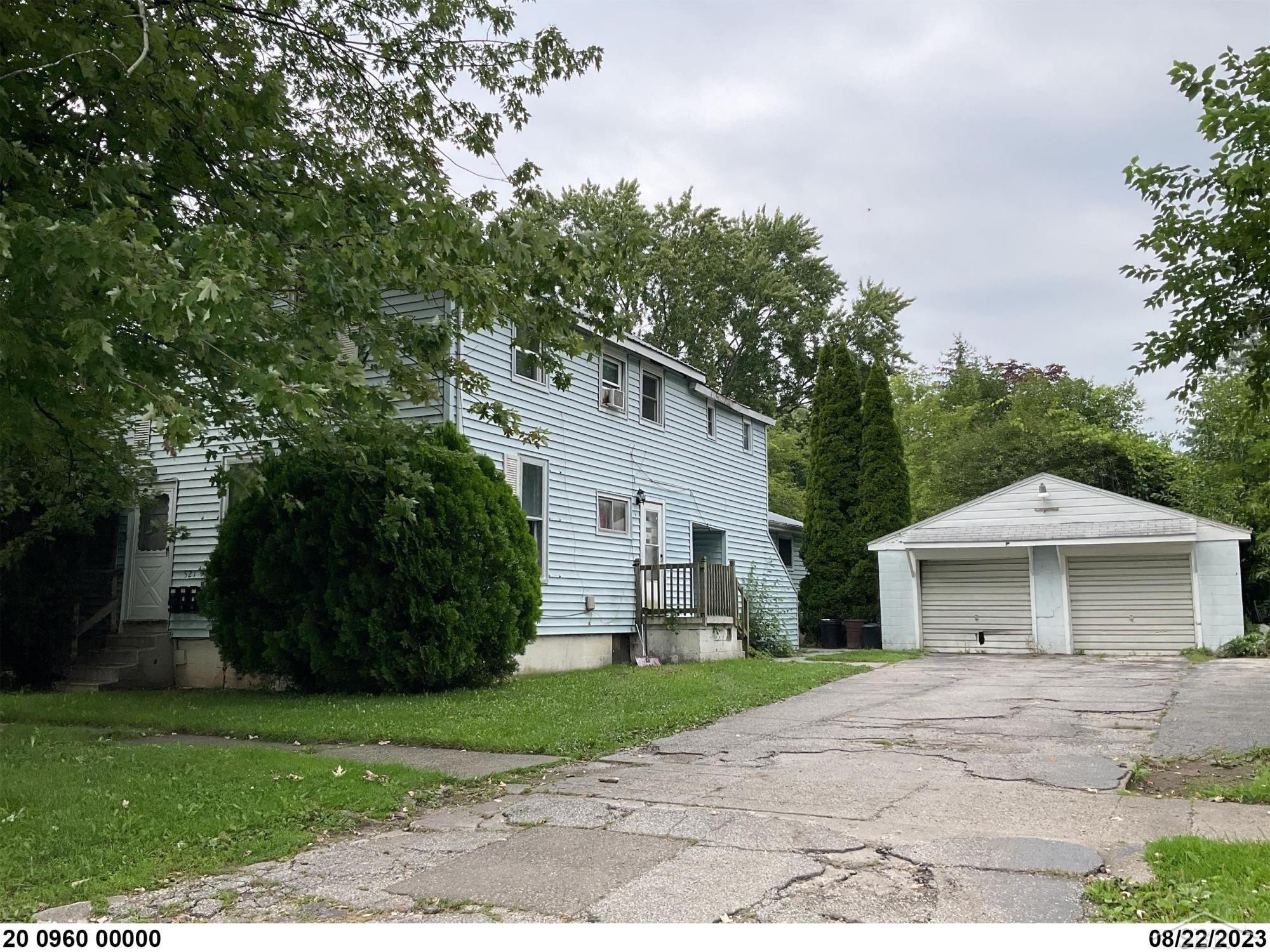 521 N CHARLES Street, Saginaw, MI 48602 — front exterior