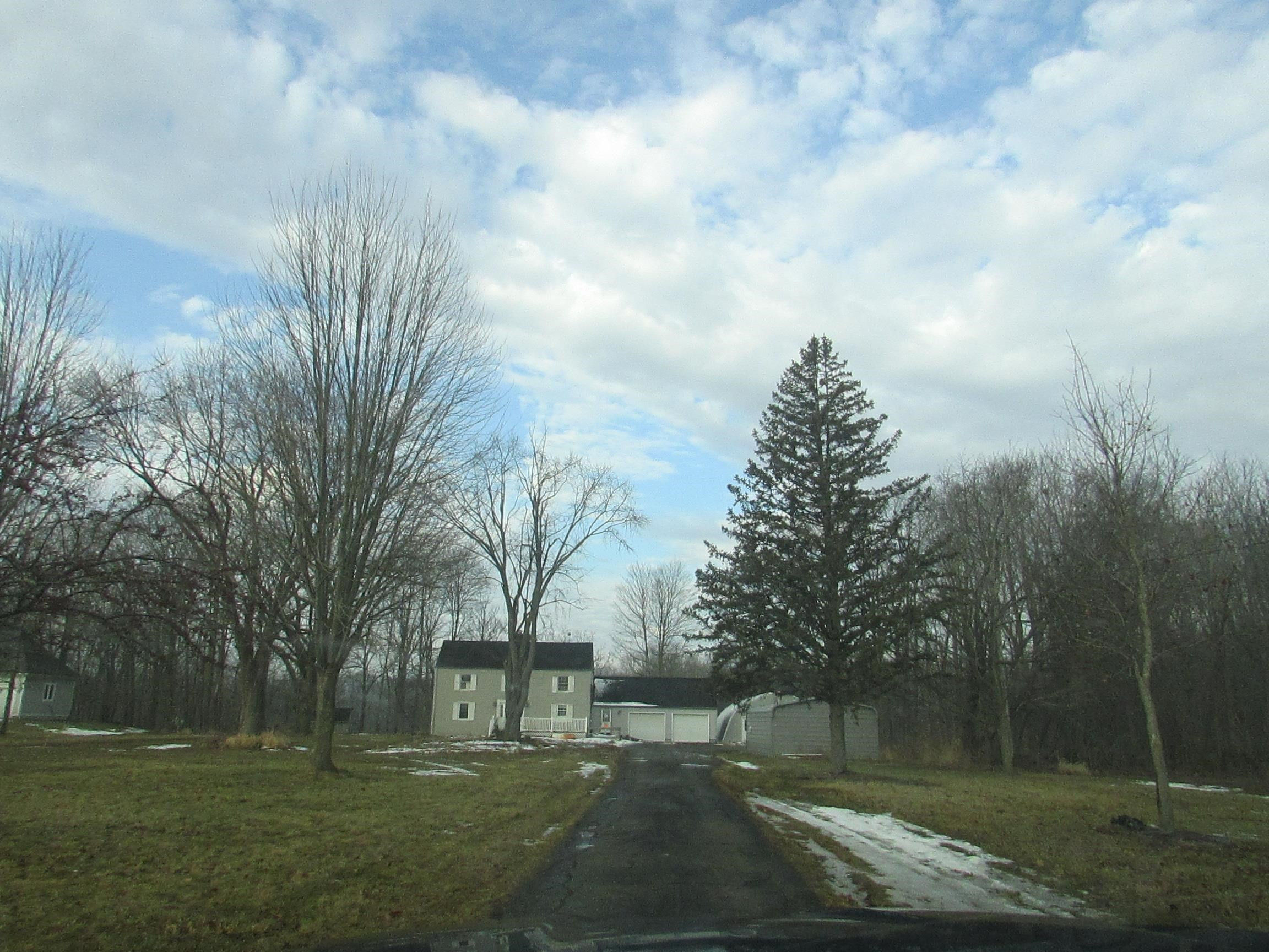 4887 W River ridge Road, Owosso, MI 48867 — front exterior