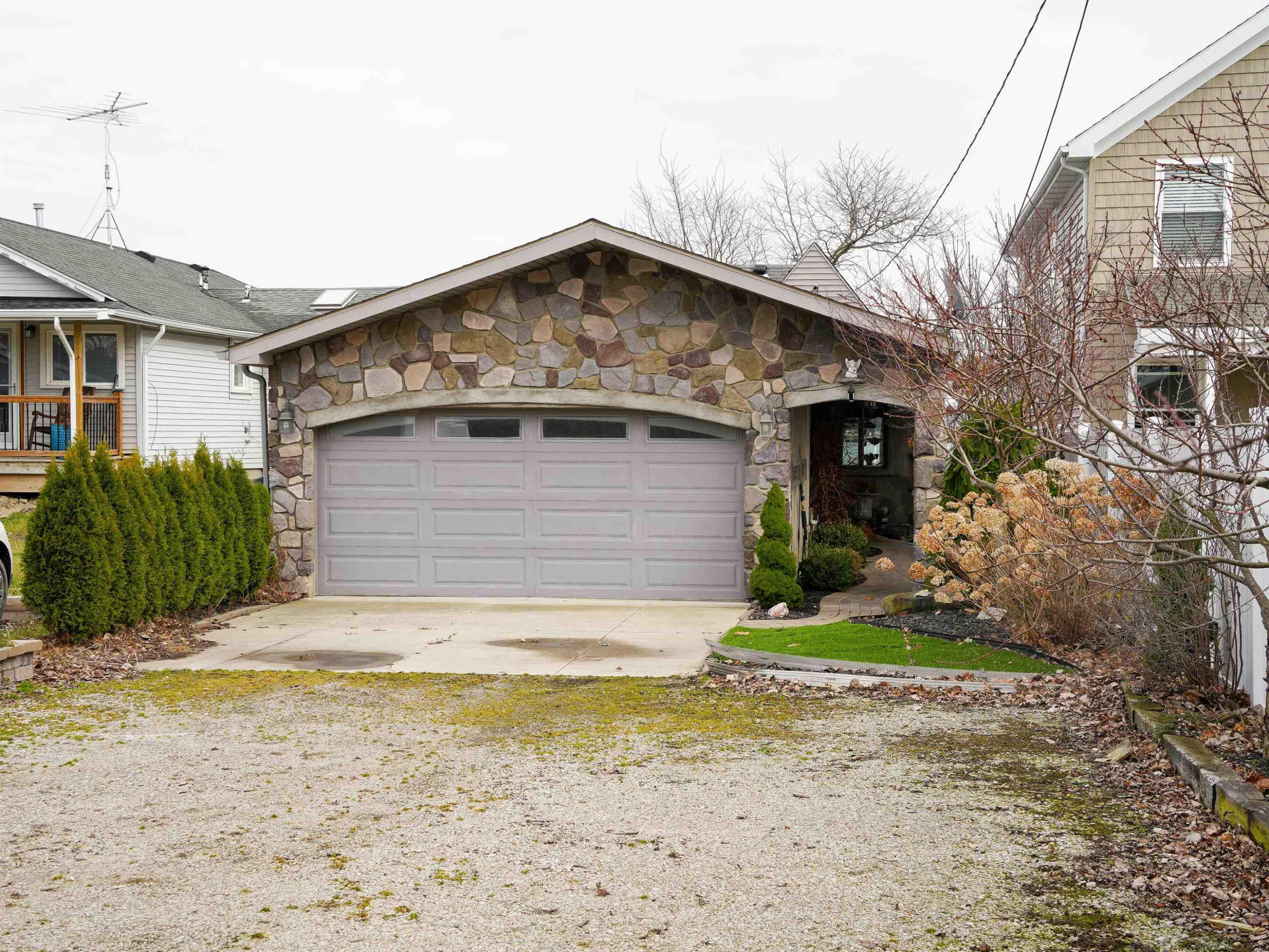 5403 Pointe Drive, MI — front exterior
