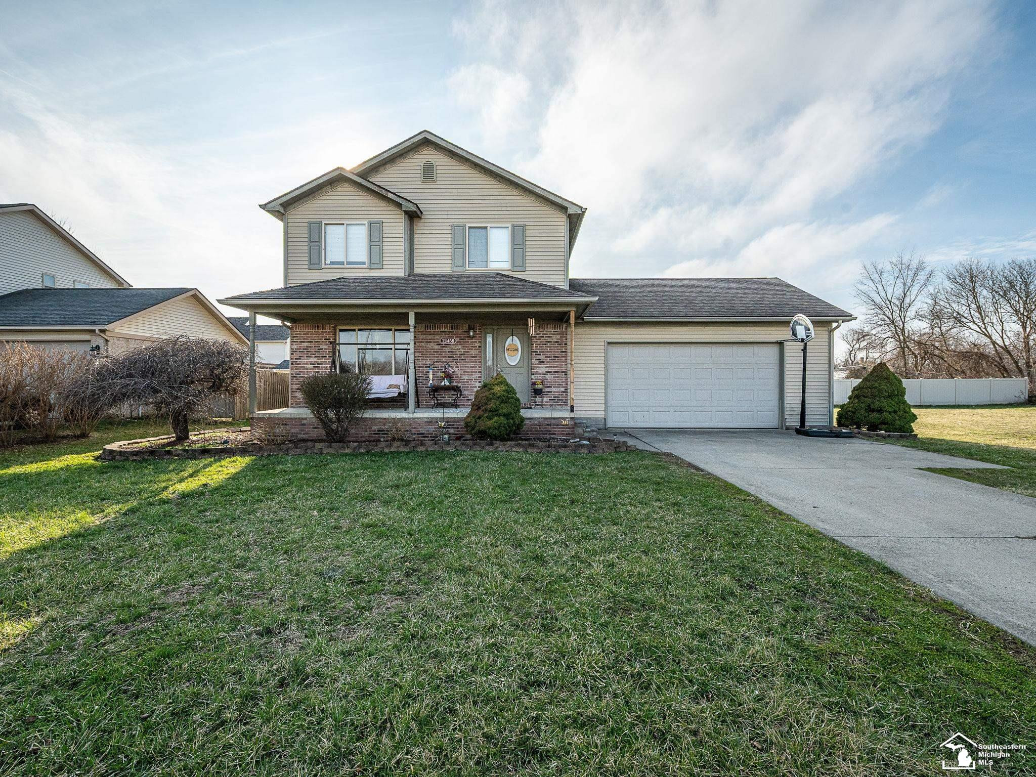 12459 Matthews Street, Carleton, MI 48117 — front exterior
