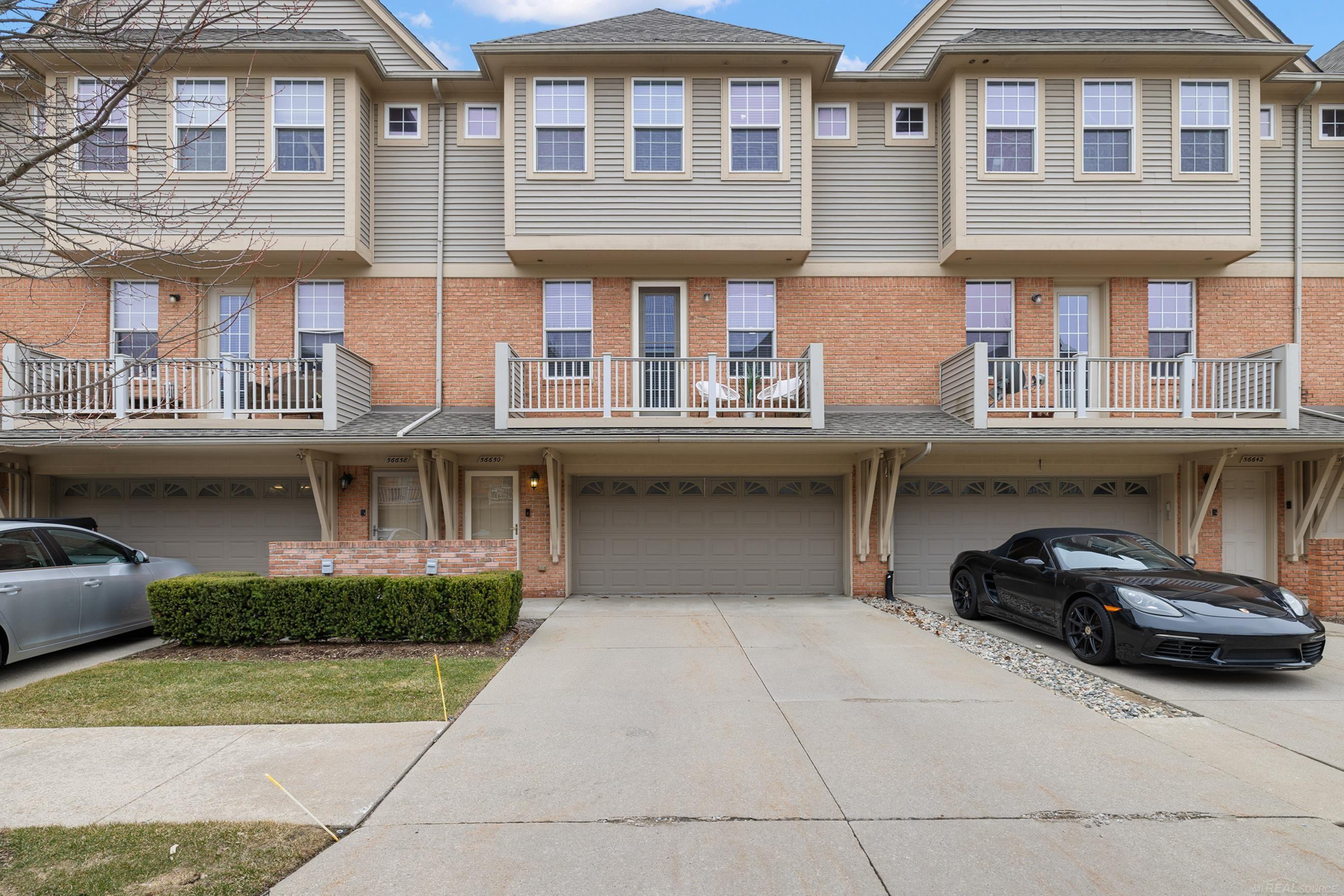 56650 Sunset Drive, Shelby Twp, MI 48316 — front exterior