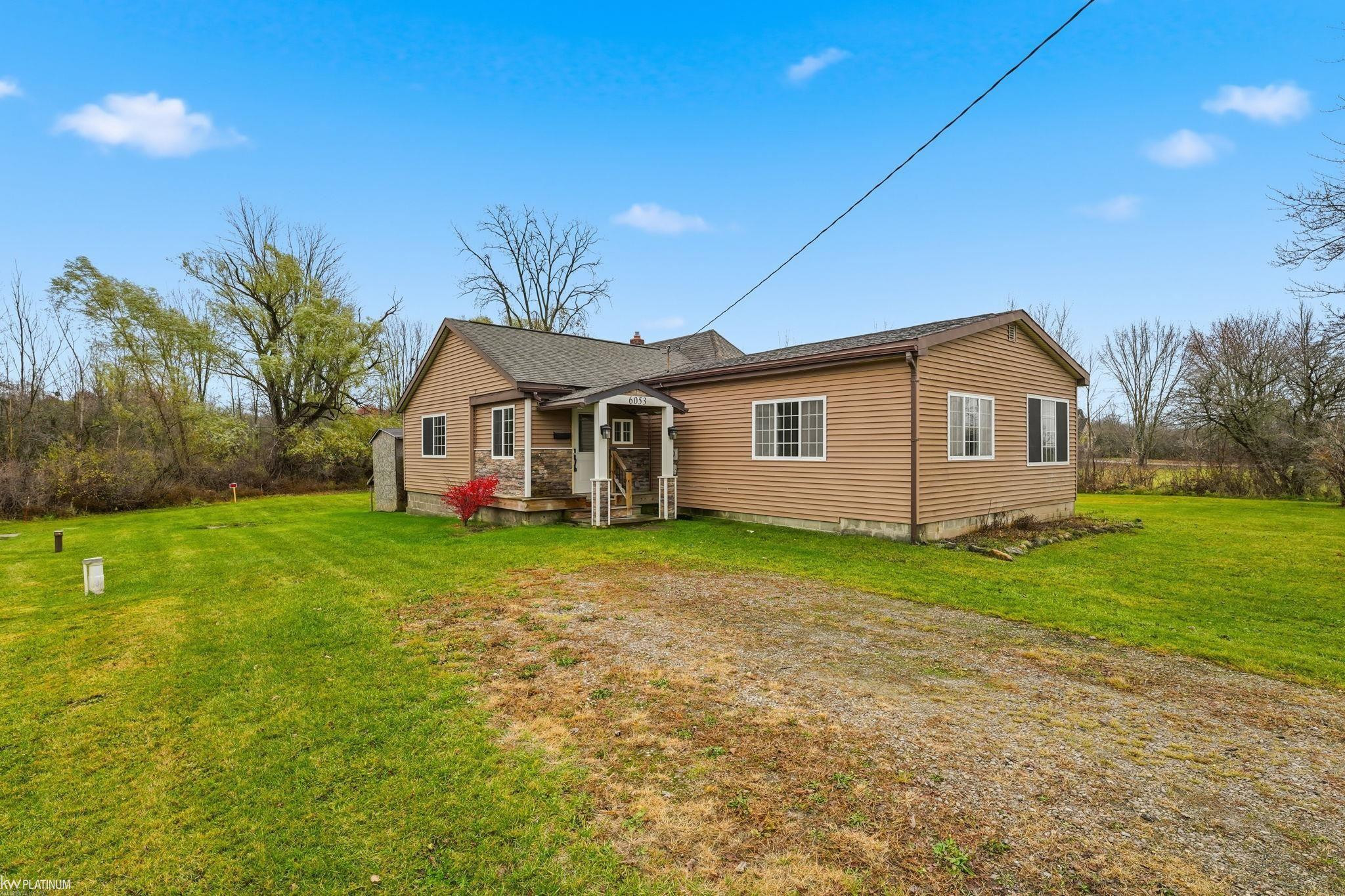 6053 Meldrum Road, MI — front exterior
