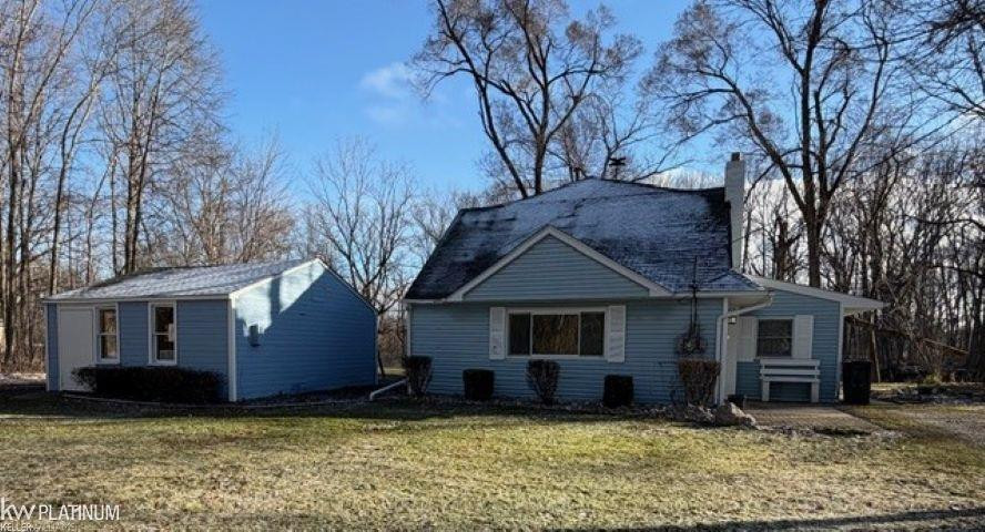 5250 Woodland Lane, MI — front exterior
