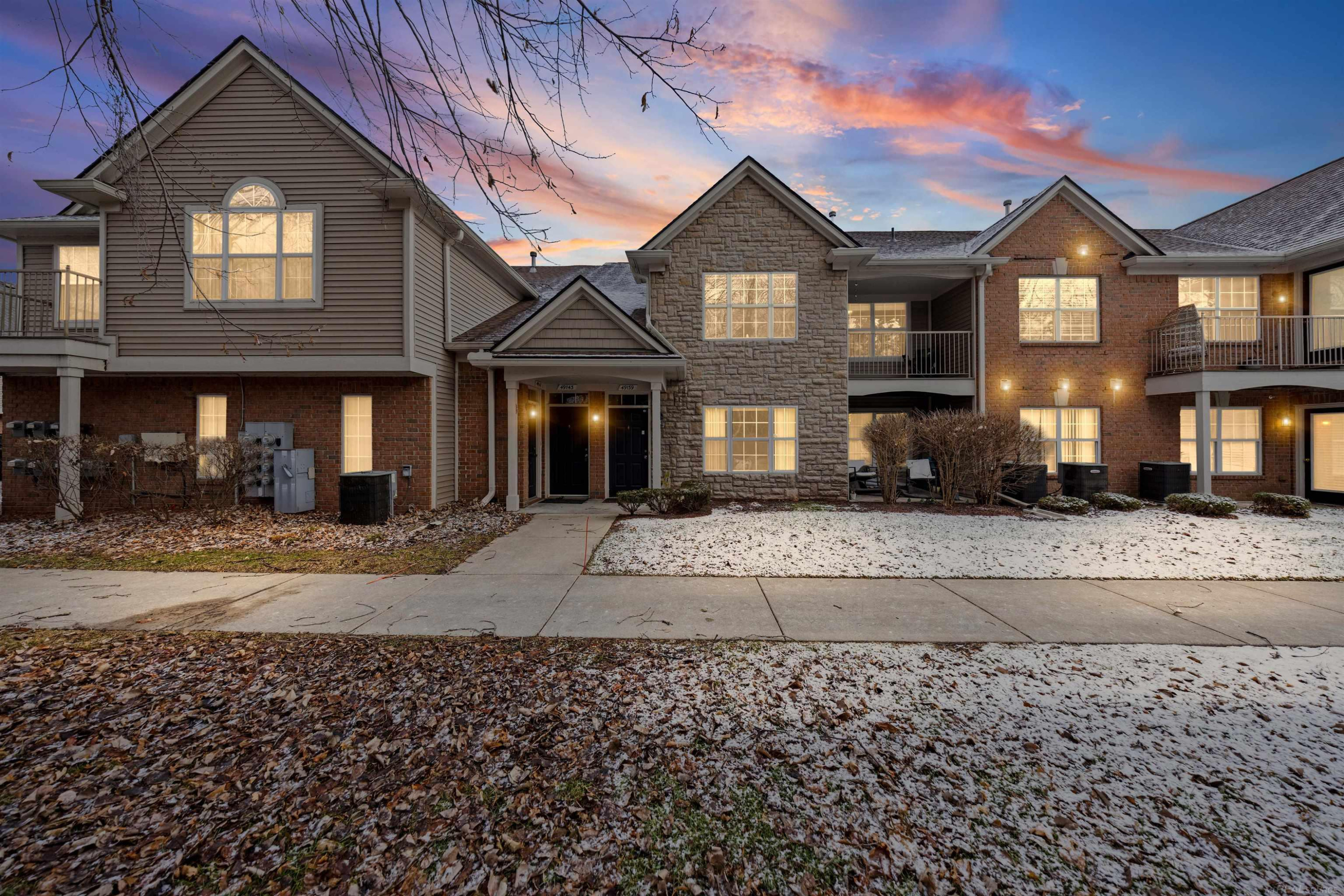 49143 W WOODS Drive, Shelby Twp, MI 48317 — front exterior