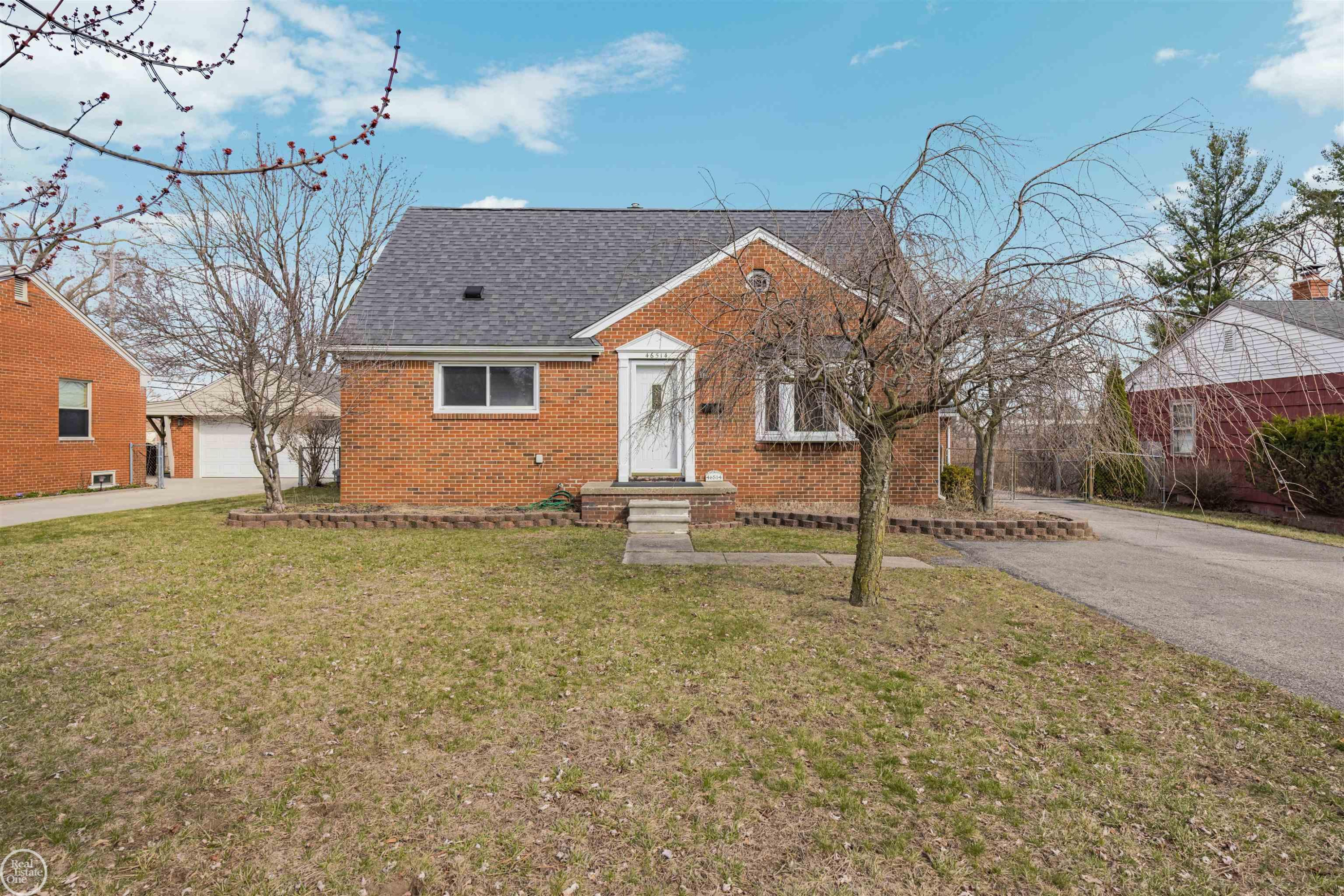 46514 Wright Avenue, Shelby Twp, MI 48317 — front exterior