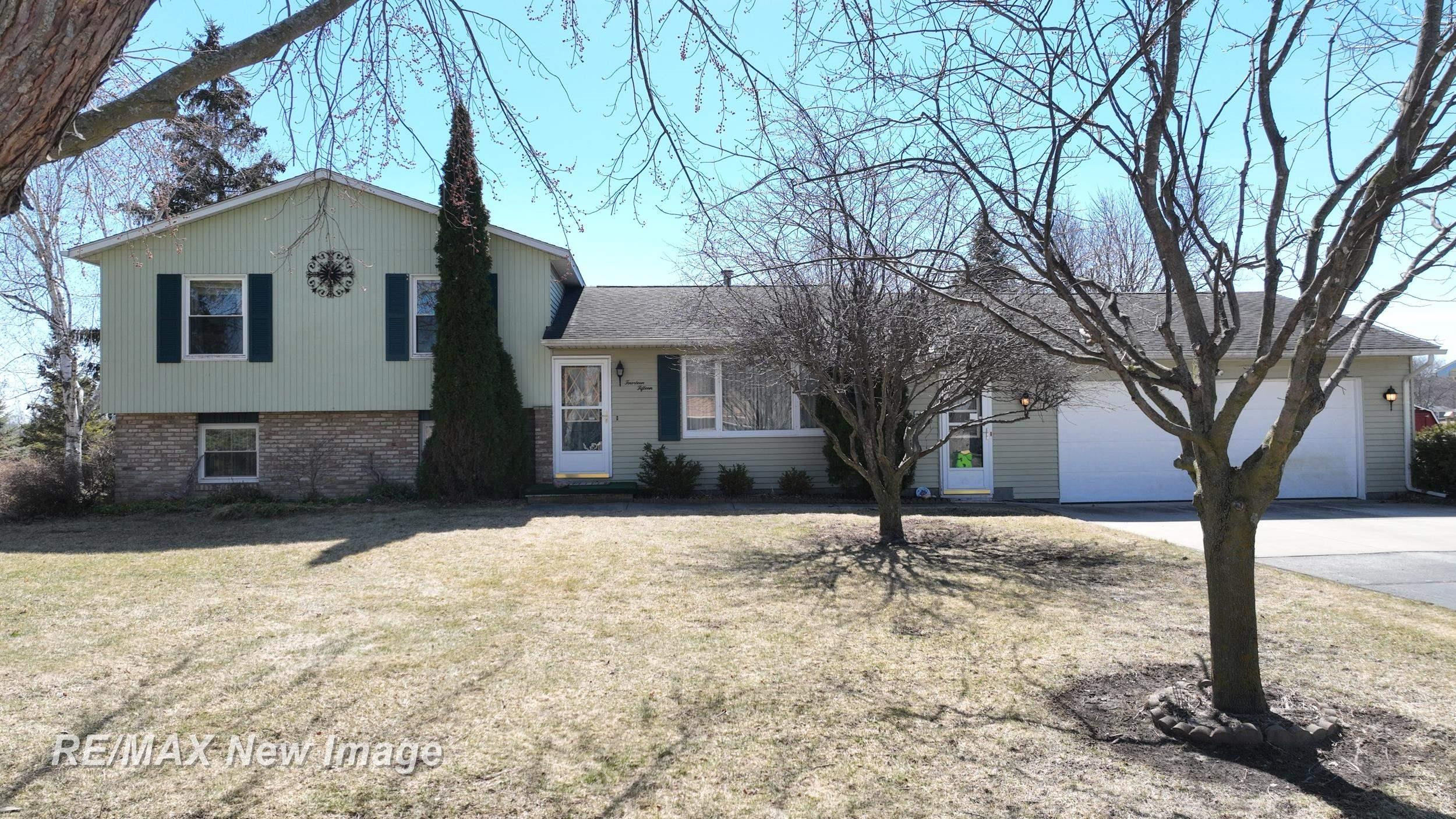 1415 W North Union Road, Auburn, MI 48611 — front exterior