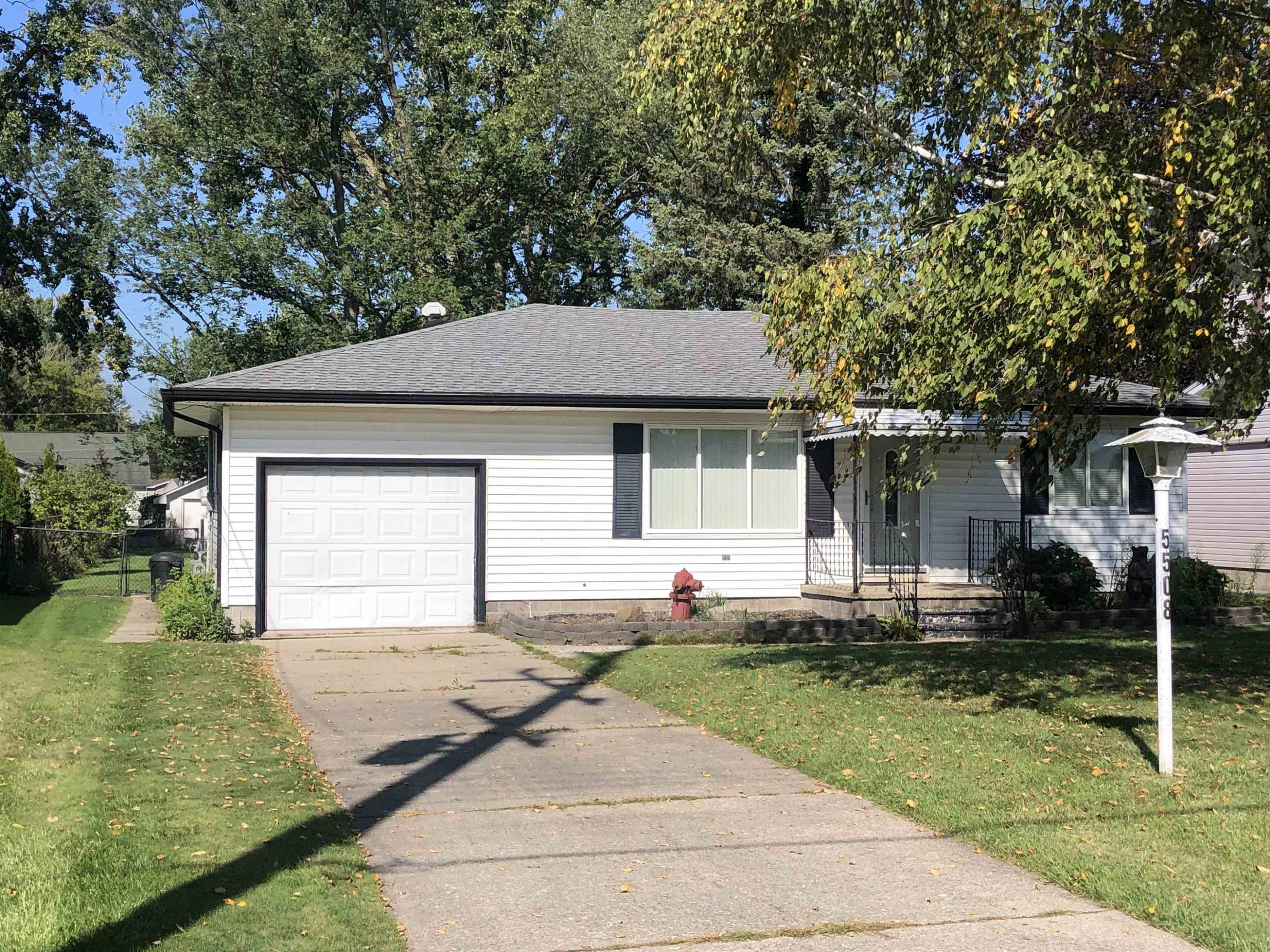 5508 Pointe Drive, MI — front exterior