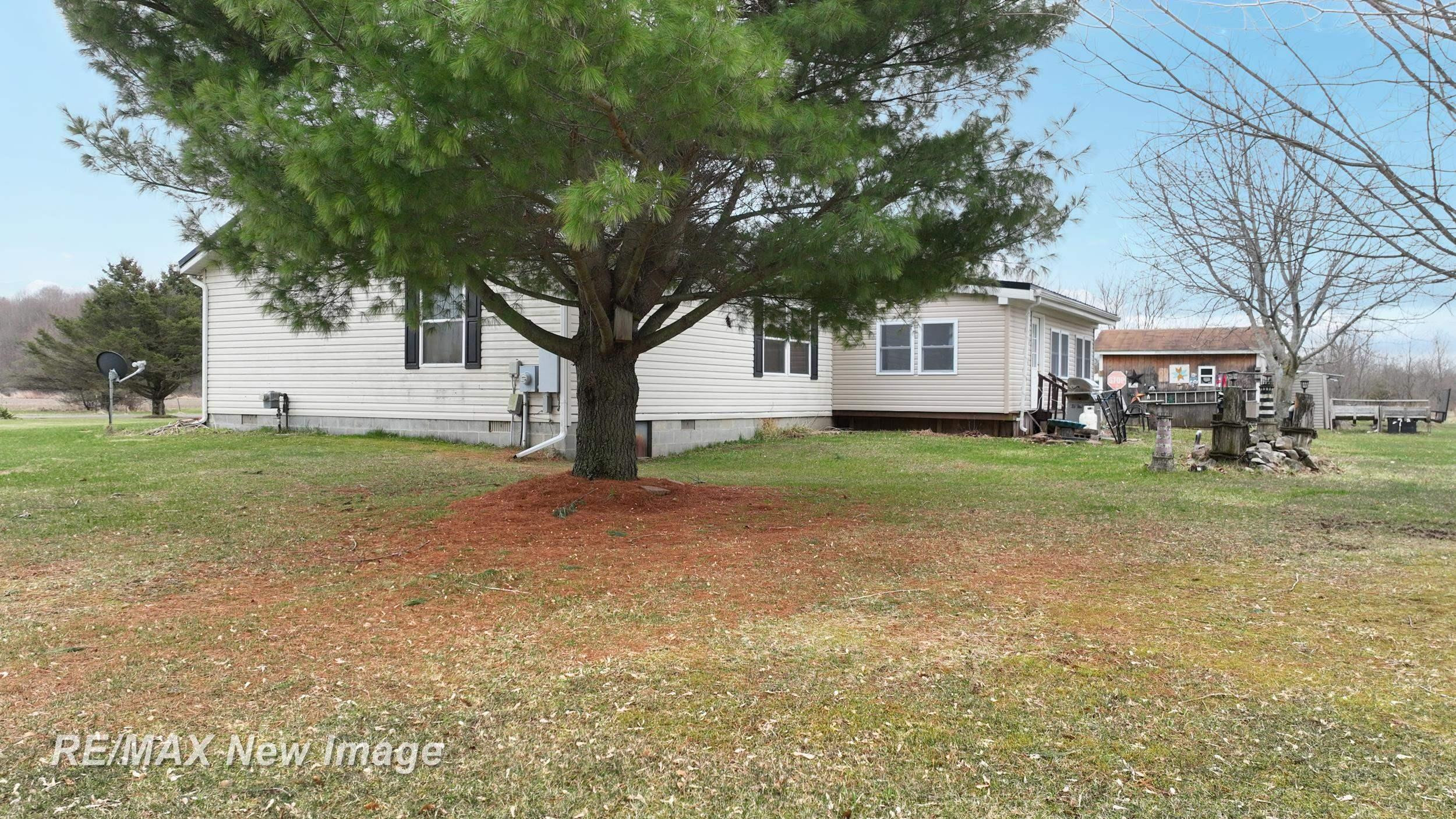 355 Carpenter Road, Fostoria, MI 48435 — Photo 31