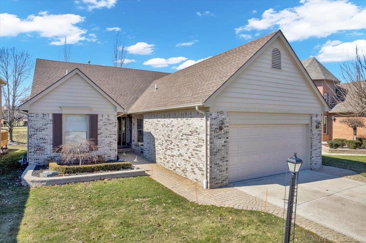 57237 Copper Creek Drive, Washington, MI — front exterior