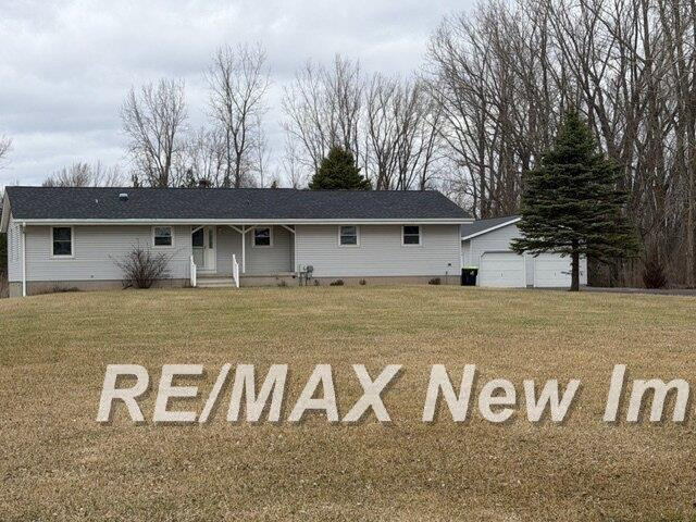 312 Chip Road, Auburn, MI 48611 — front exterior