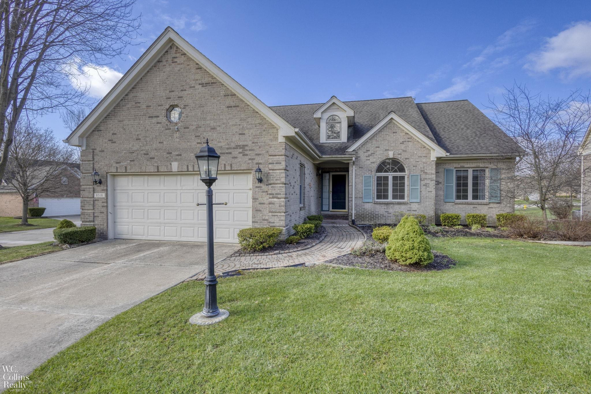 8518 Invitational Drive, 42, MI — front exterior