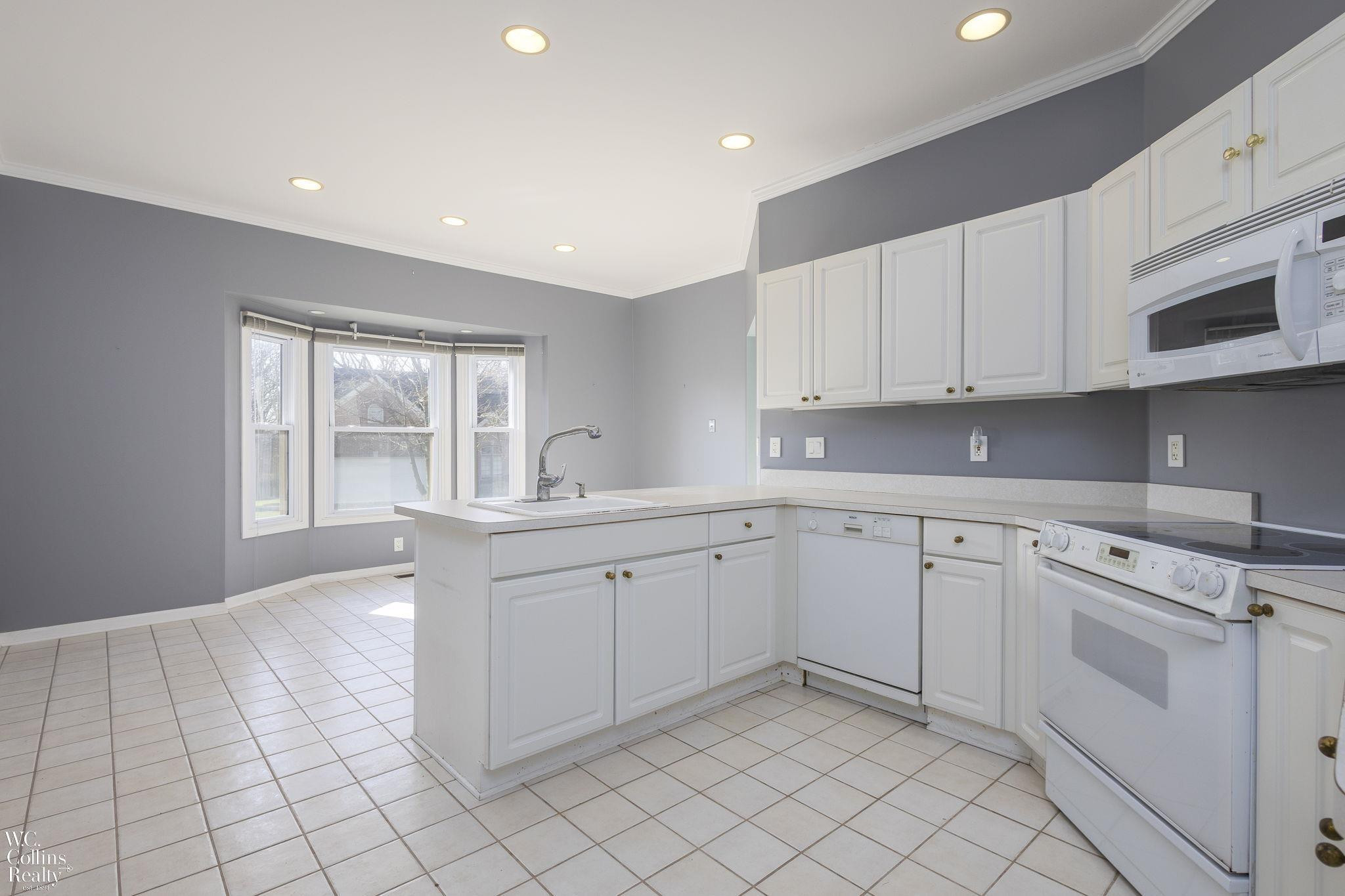 8518 Invitational Drive, 42, MI — Photo 13